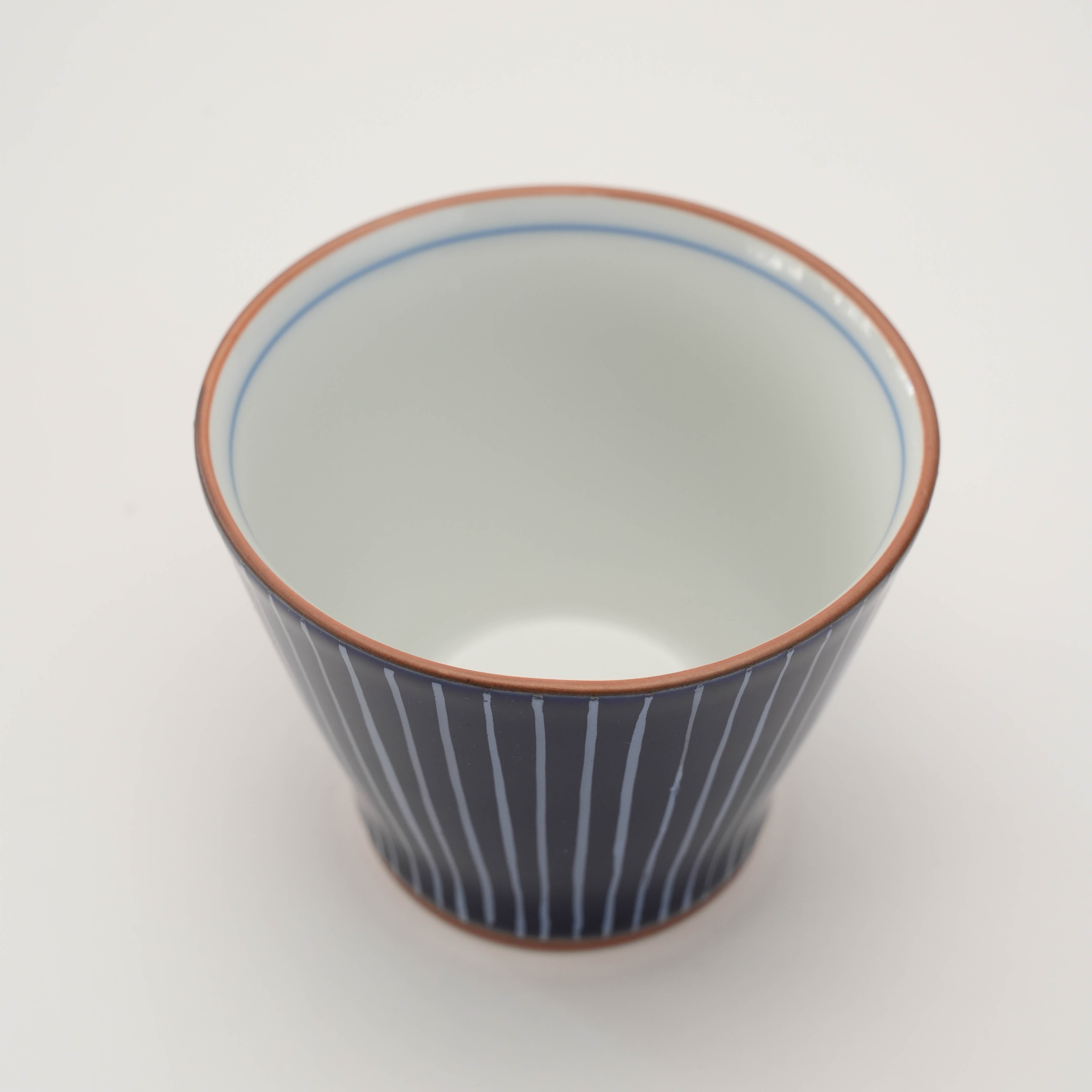 Top view of blue Shiraito Teacup showing smooth white interior and hand-painted rim. Perfect for Japanese tea ceremonies.