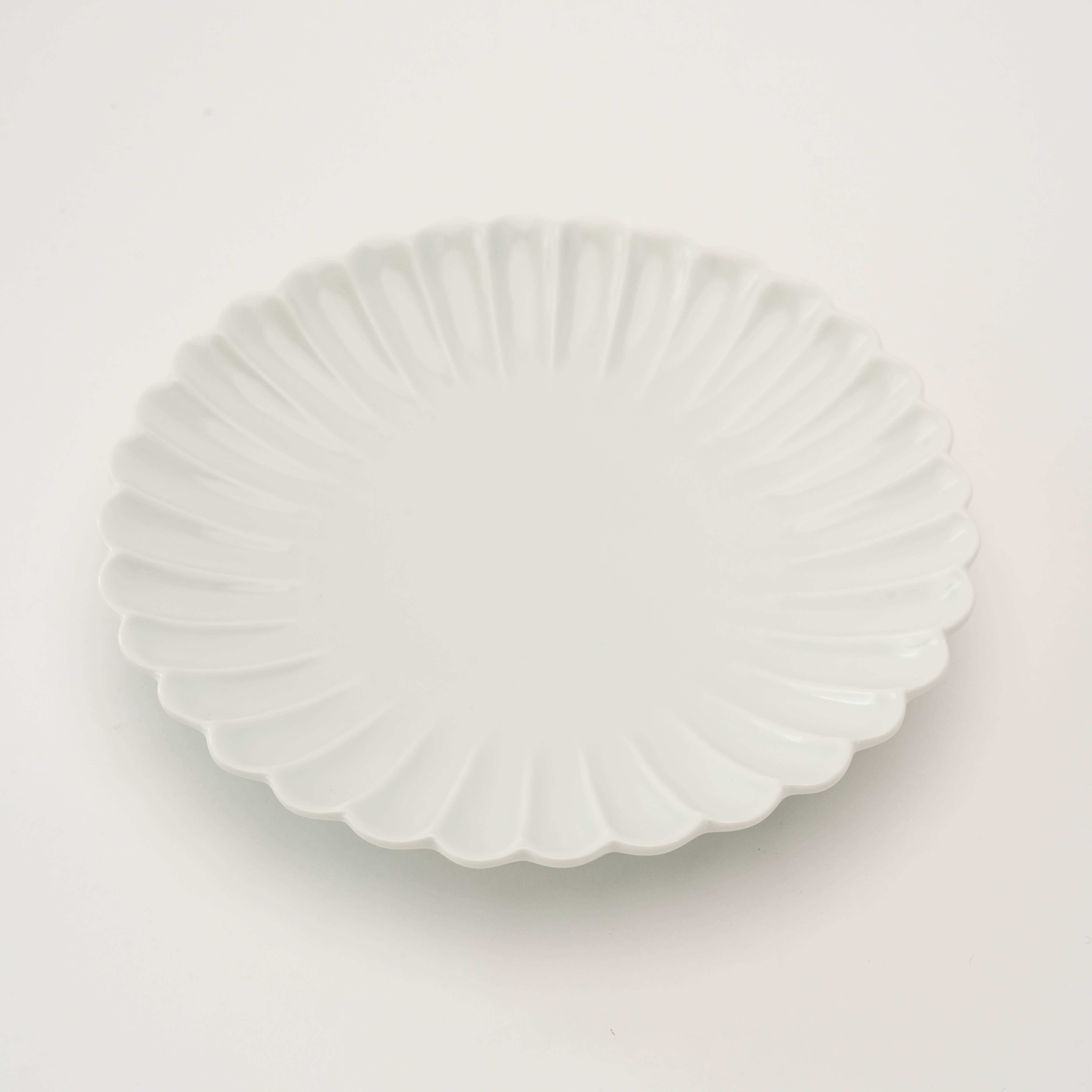 Top angle of Arita Ware Chrysanthemum Plate, 15cm matte white finish with detailed petal-shaped edges, ideal for refined dining presentations.