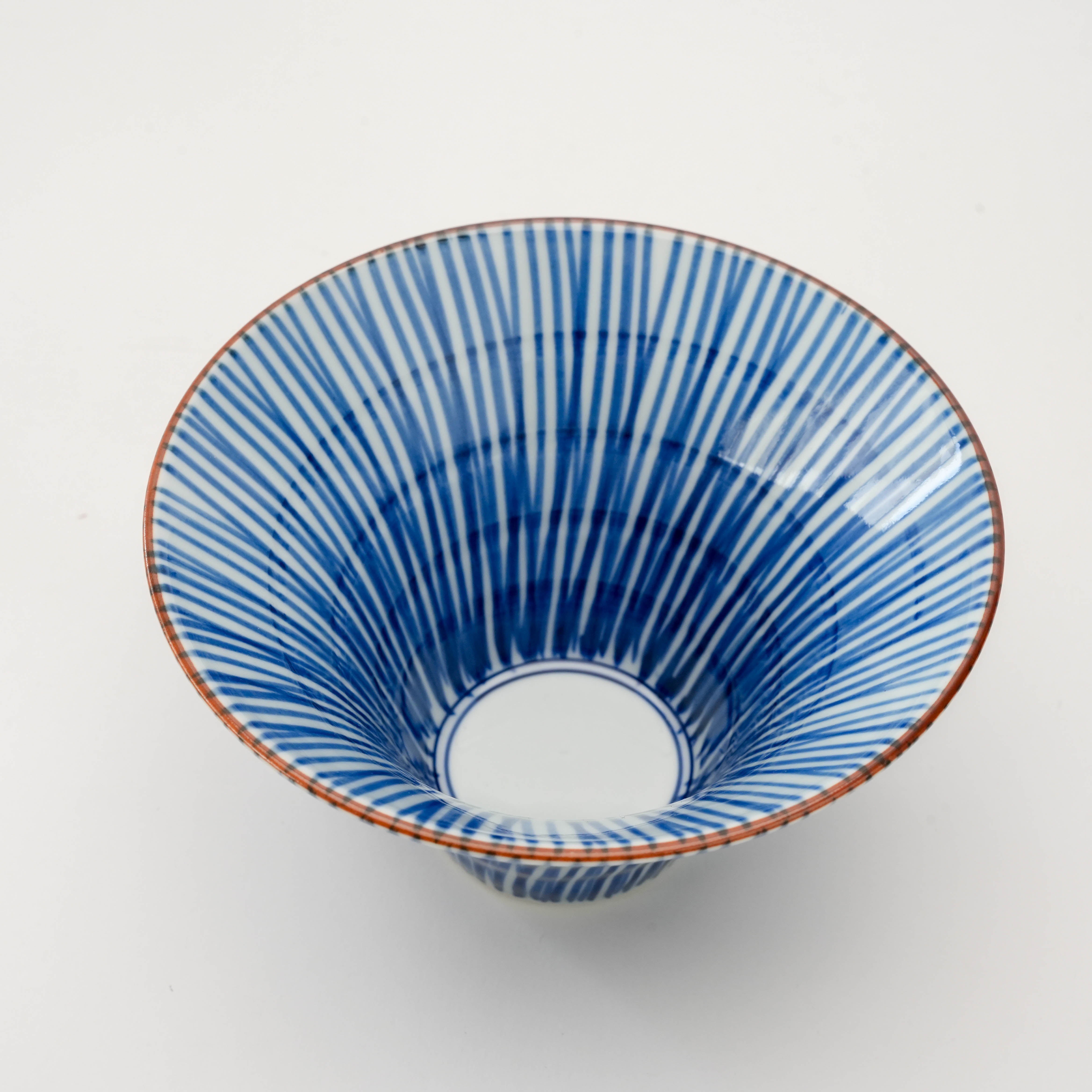 Top view of blue Arita Ware Flared Bowl - Small Bowl | 12cm Hand-Painted showcasing detailed Tokusa brushstroke interior artwork.