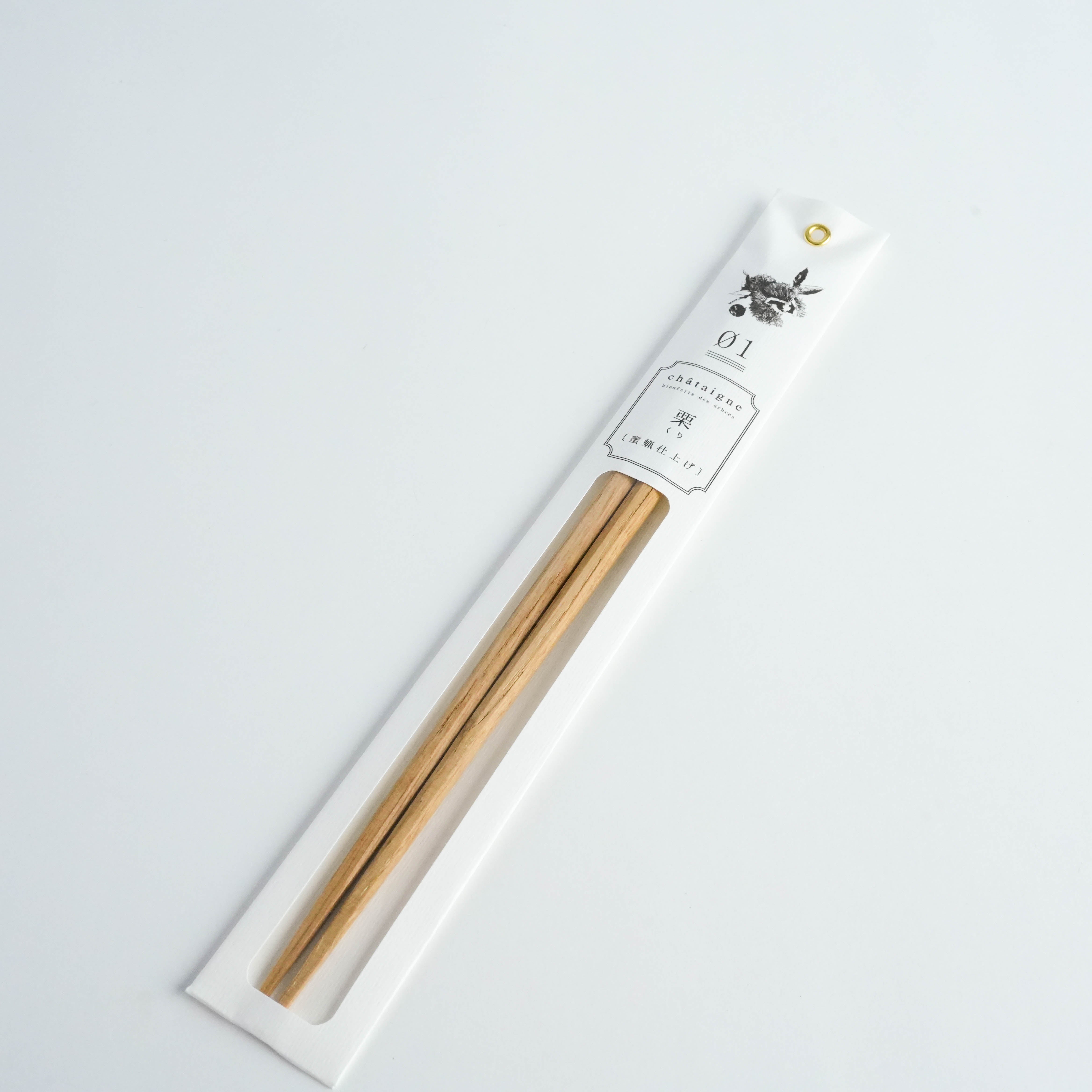 Kawai Tetoca Chopsticks - Chestnut Wood in minimalist white packaging with Japanese label, showcasing natural beeswax finish and octagonal grip.