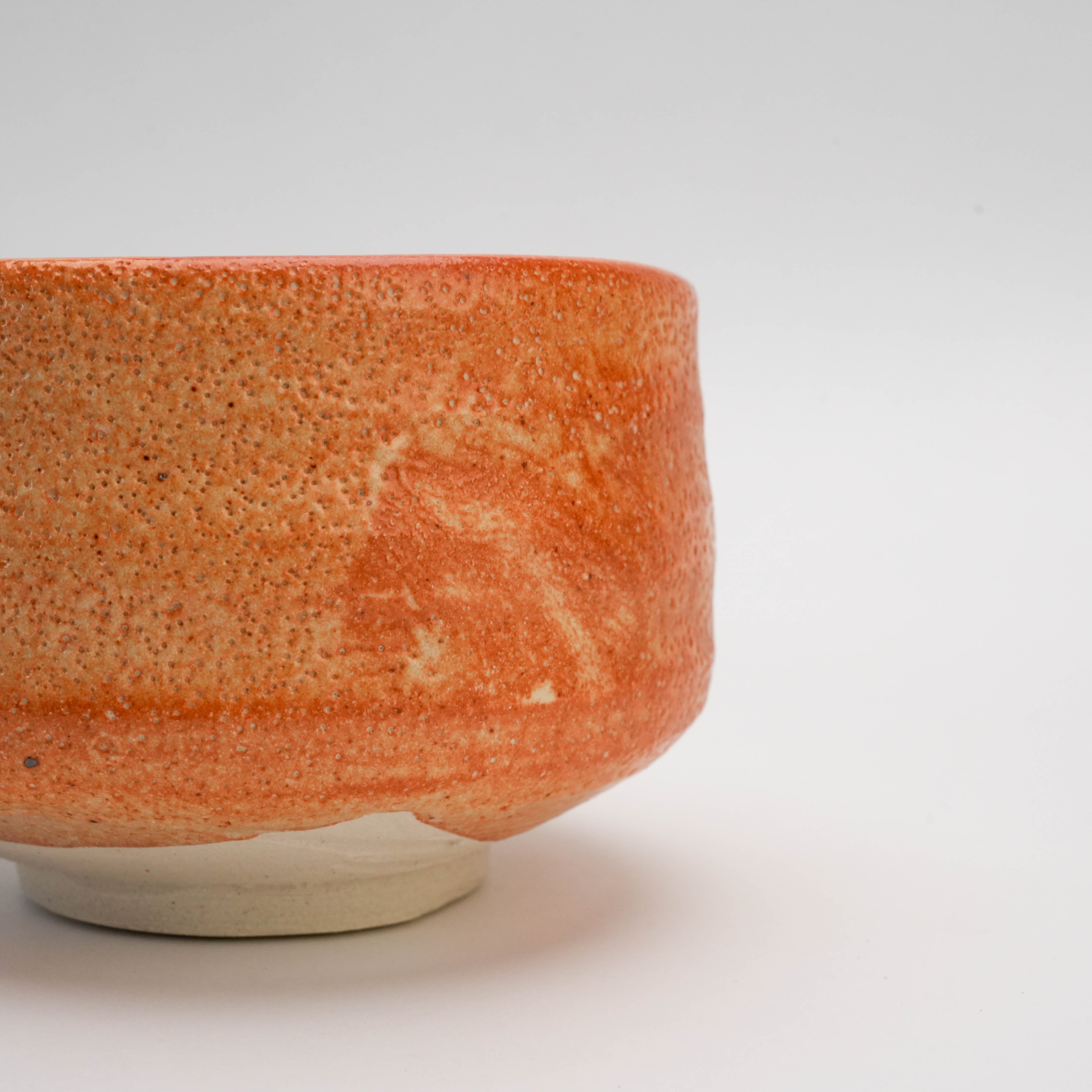 Detail of Mino Ware Persimmon Glaze Matcha Bowl highlighting the wabi-sabi texture and natural glaze variation, perfect for tea lovers and collectors.