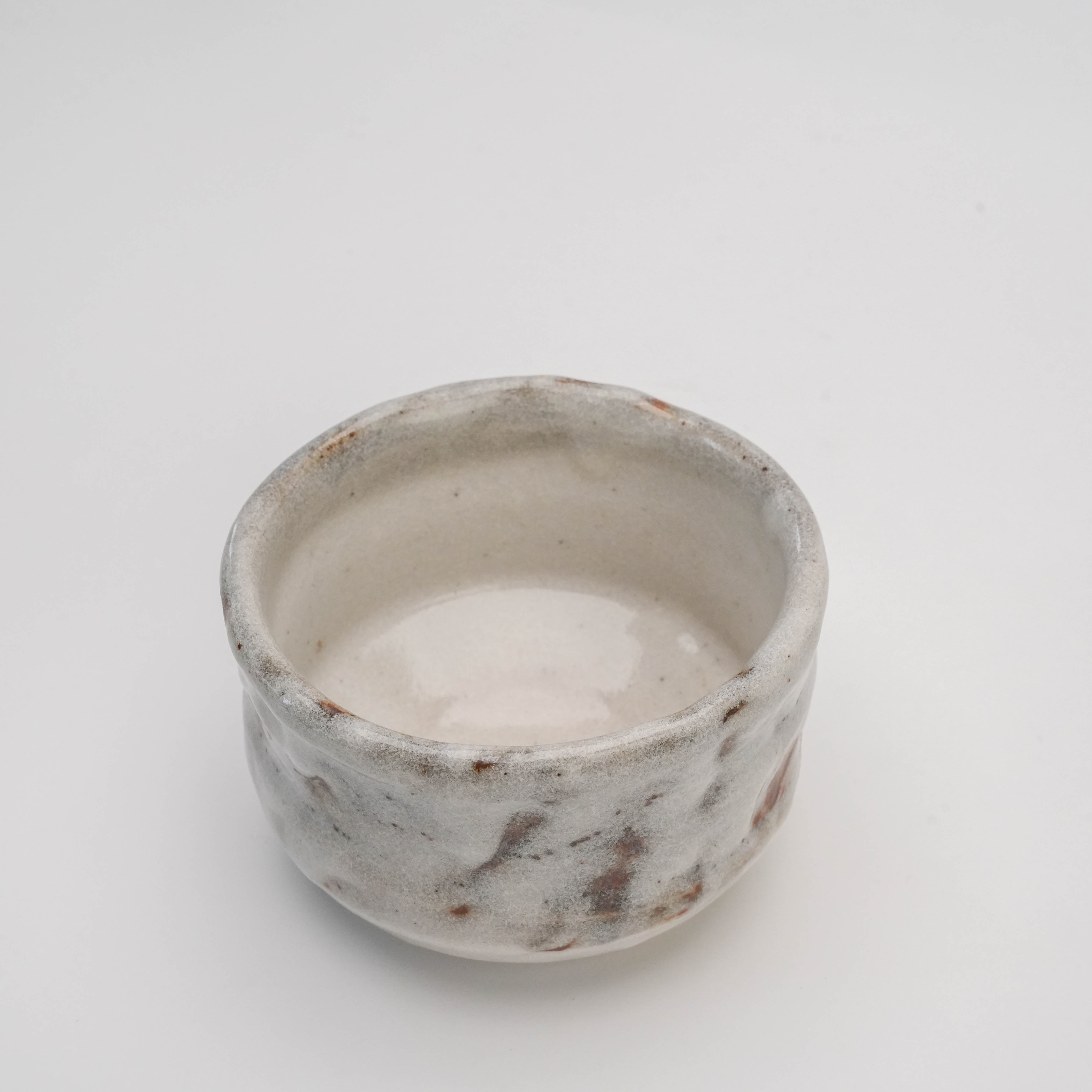 Top view of Mino Ware Matcha Bowl - Oni-Shino Nodate showing smooth interior and hand-shaped rim, perfect for tea rituals or minimalist decor.