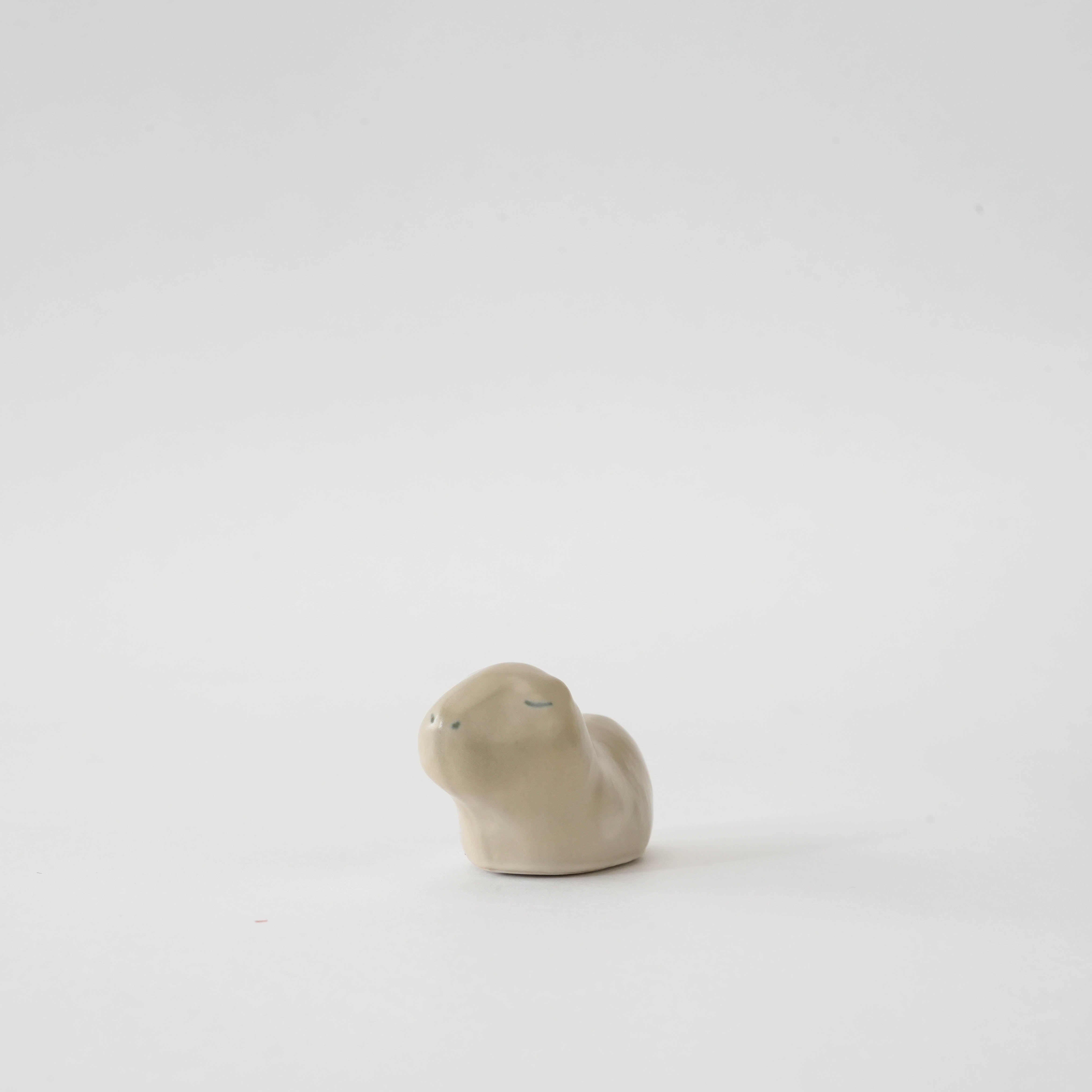 Minimalist Capybara Chopstick Rest - Craftsmanship Gift | Arita Ware, featuring a smooth finish and peaceful expression for elegant tableware.