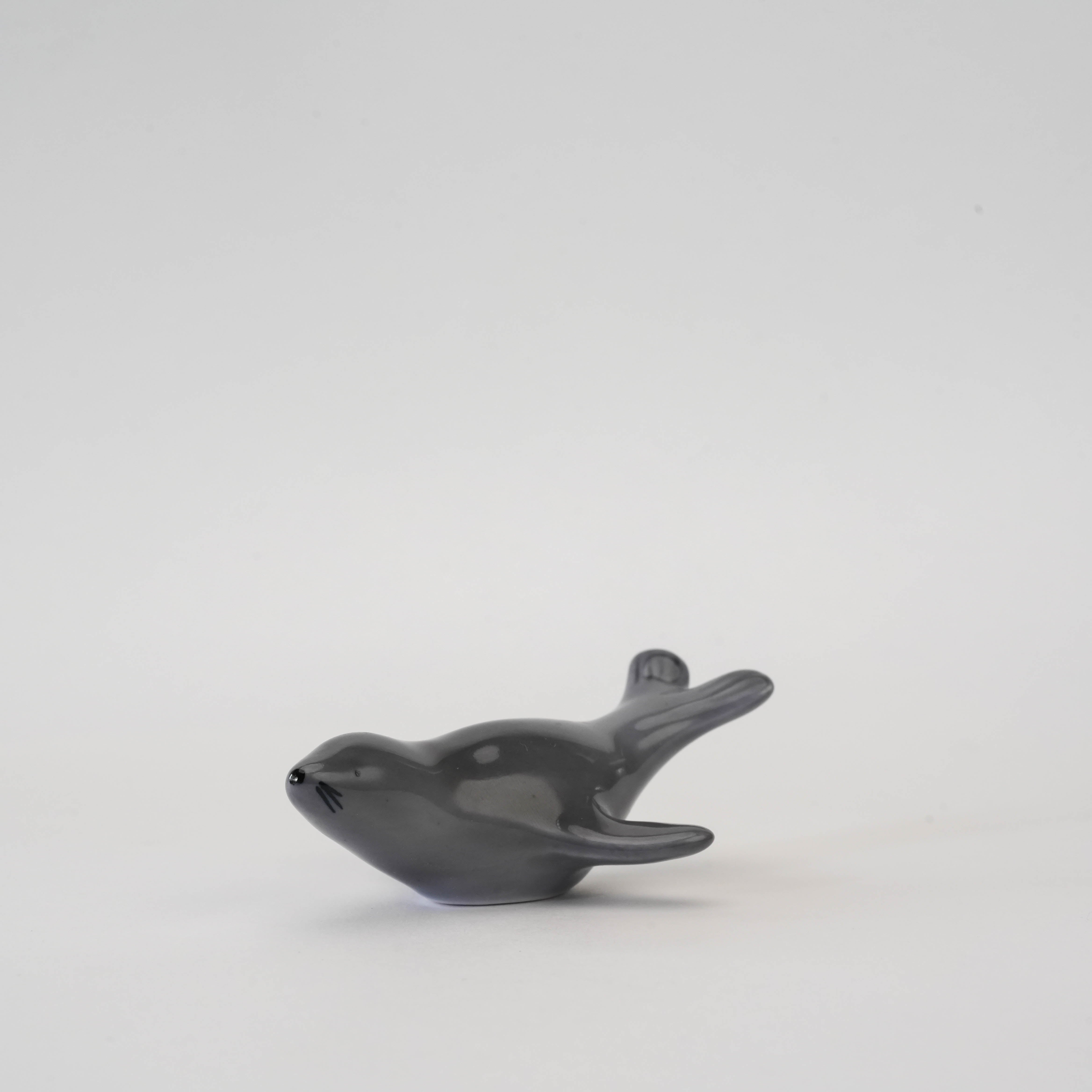 Close-up of the Arita Ware Fur Seal Chopstick Rest showing detailed craftsmanship in high-quality porcelain for stylish tableware.