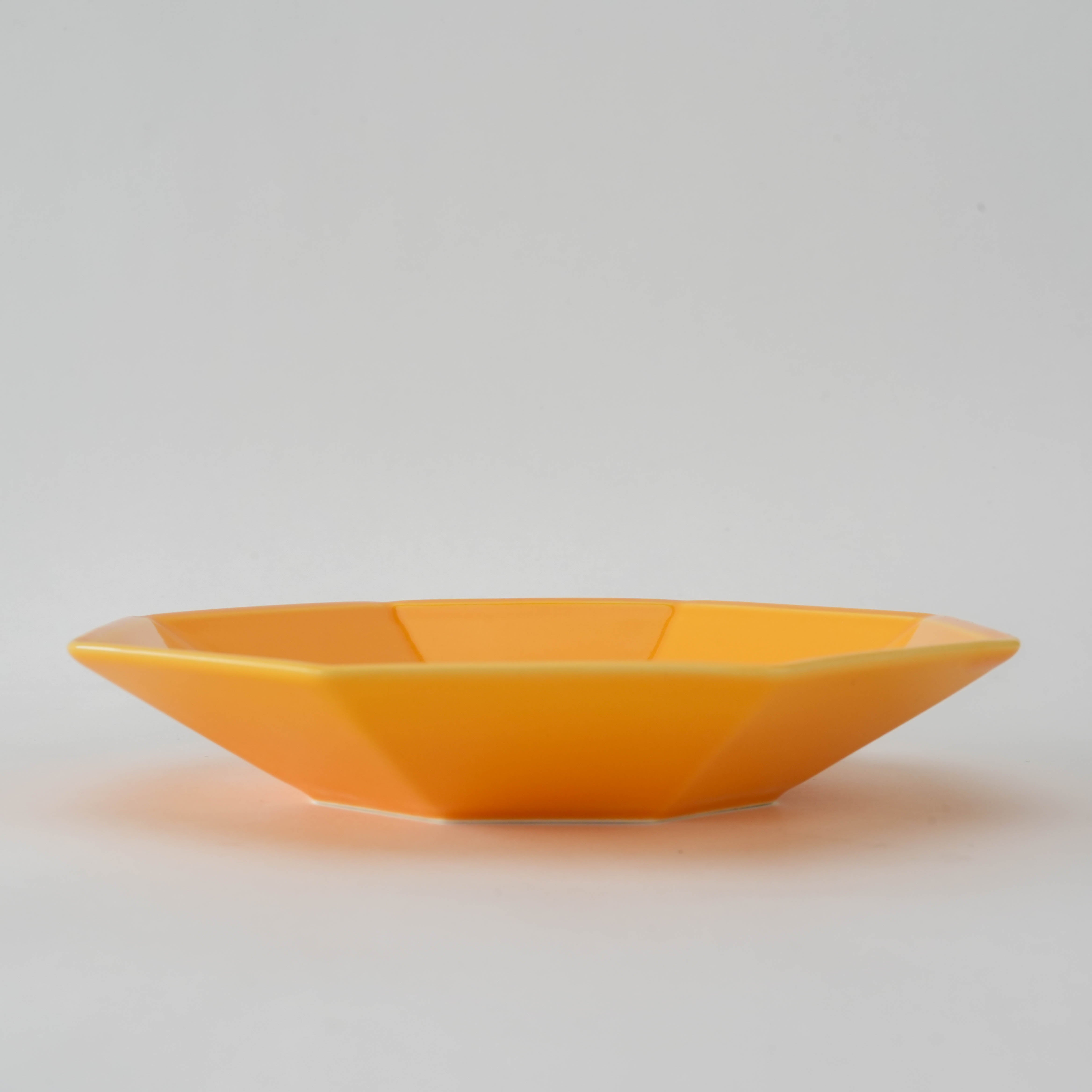 Side view of Yellow Glaze Octagonal Plate - Mino Ware highlighting its shallow depth and clean lines in contemporary Japanese tableware.