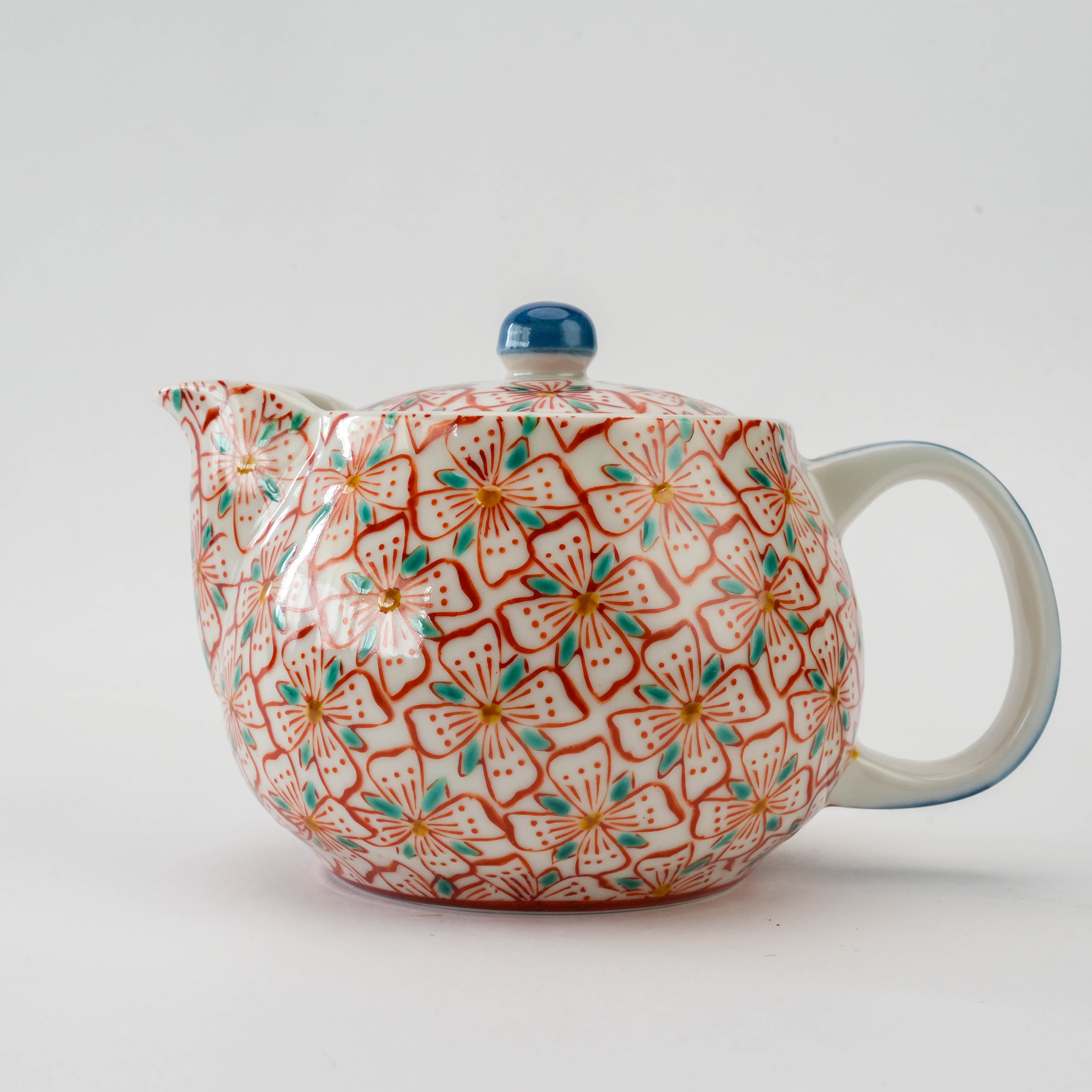 Close-up of Kutani Ware Teapot - Red Blossom highlighting detailed floral artwork and glossy porcelain finish, perfect for stylish tea settings.