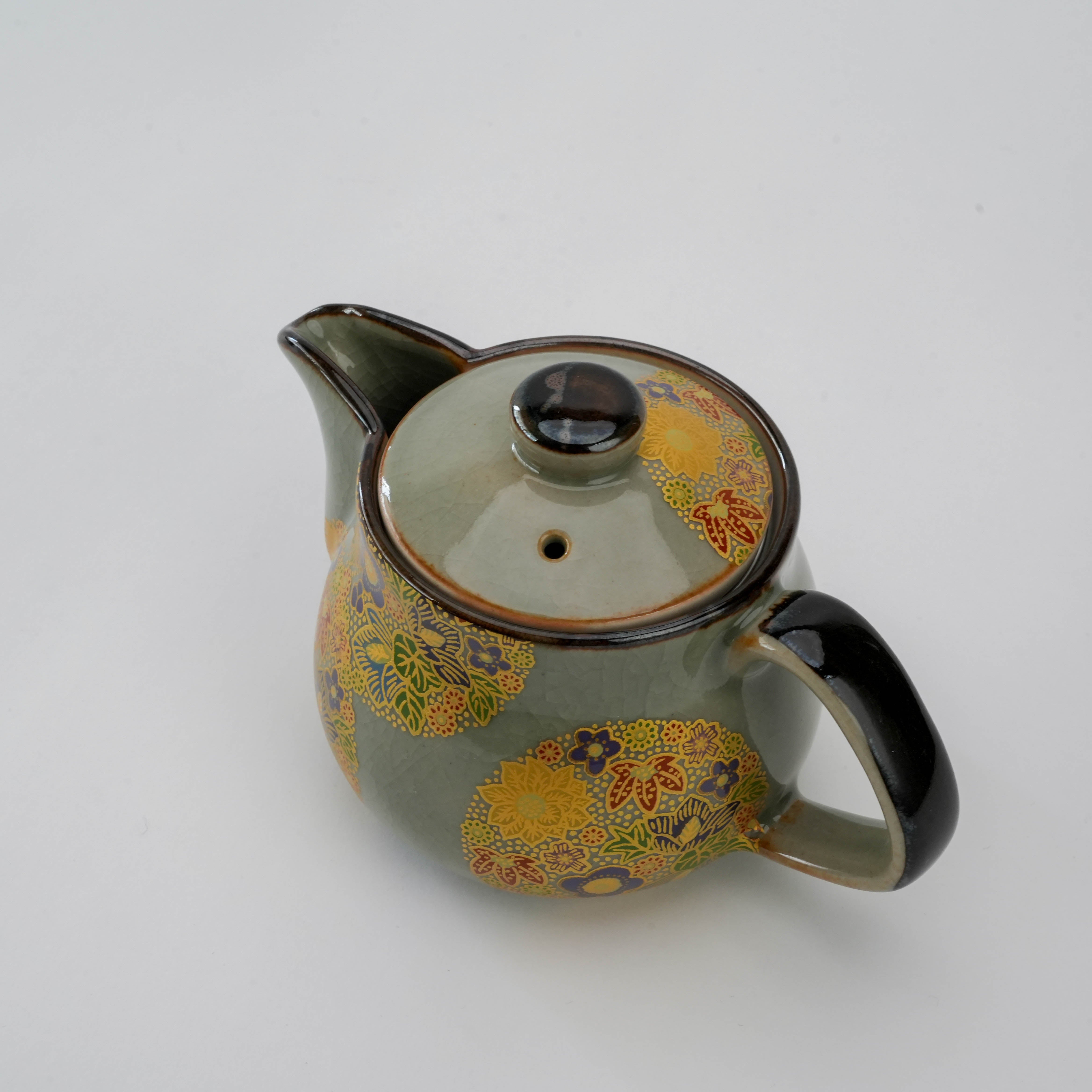 Top view of Kutani Teapot - Golden Floral Design showing lid and spout. Japanese ceramic craftsmanship with vibrant floral patterns.
