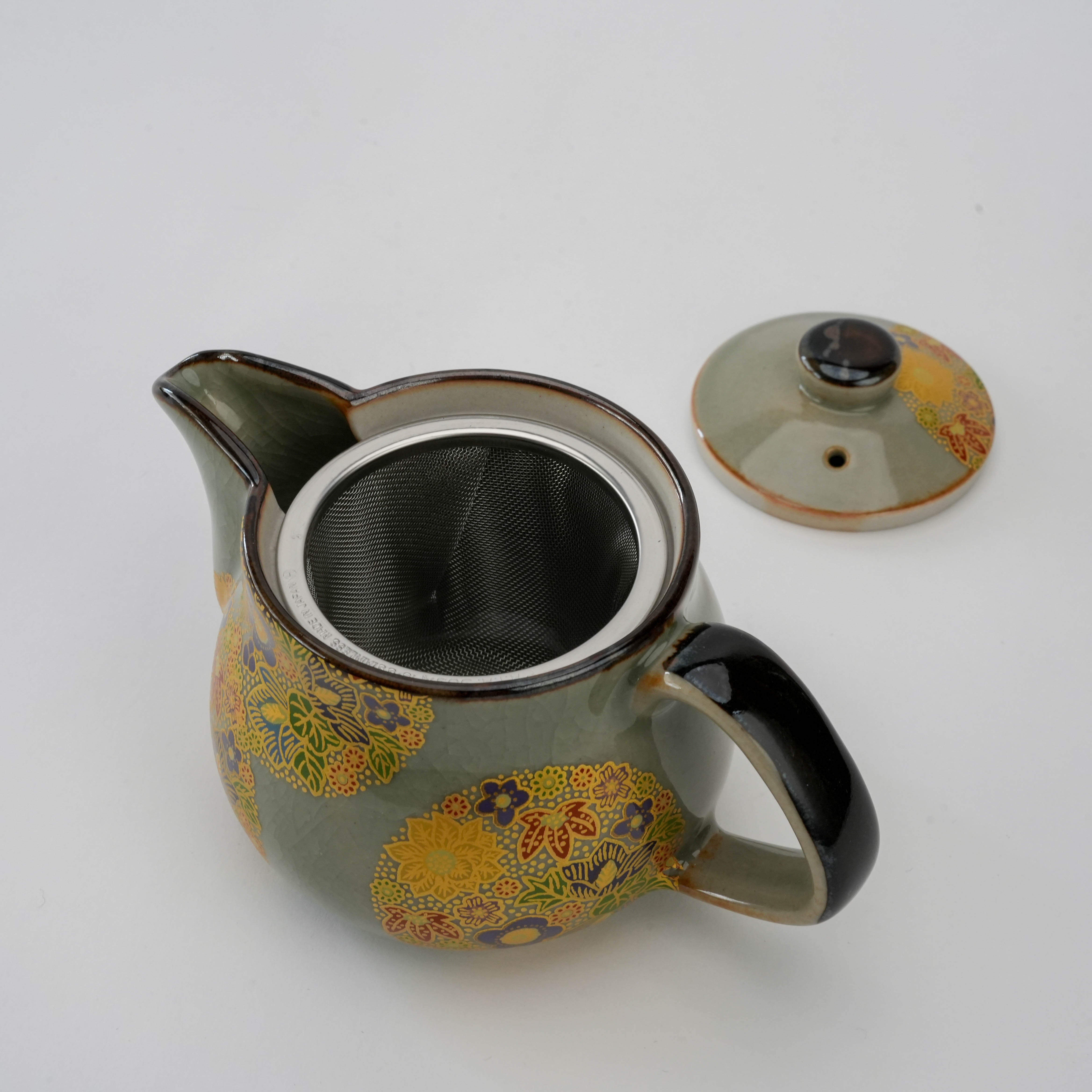 Kutani Teapot with lid removed, revealing built-in stainless steel infuser. 250ml Japanese teapot perfect for brewing loose-leaf tea.