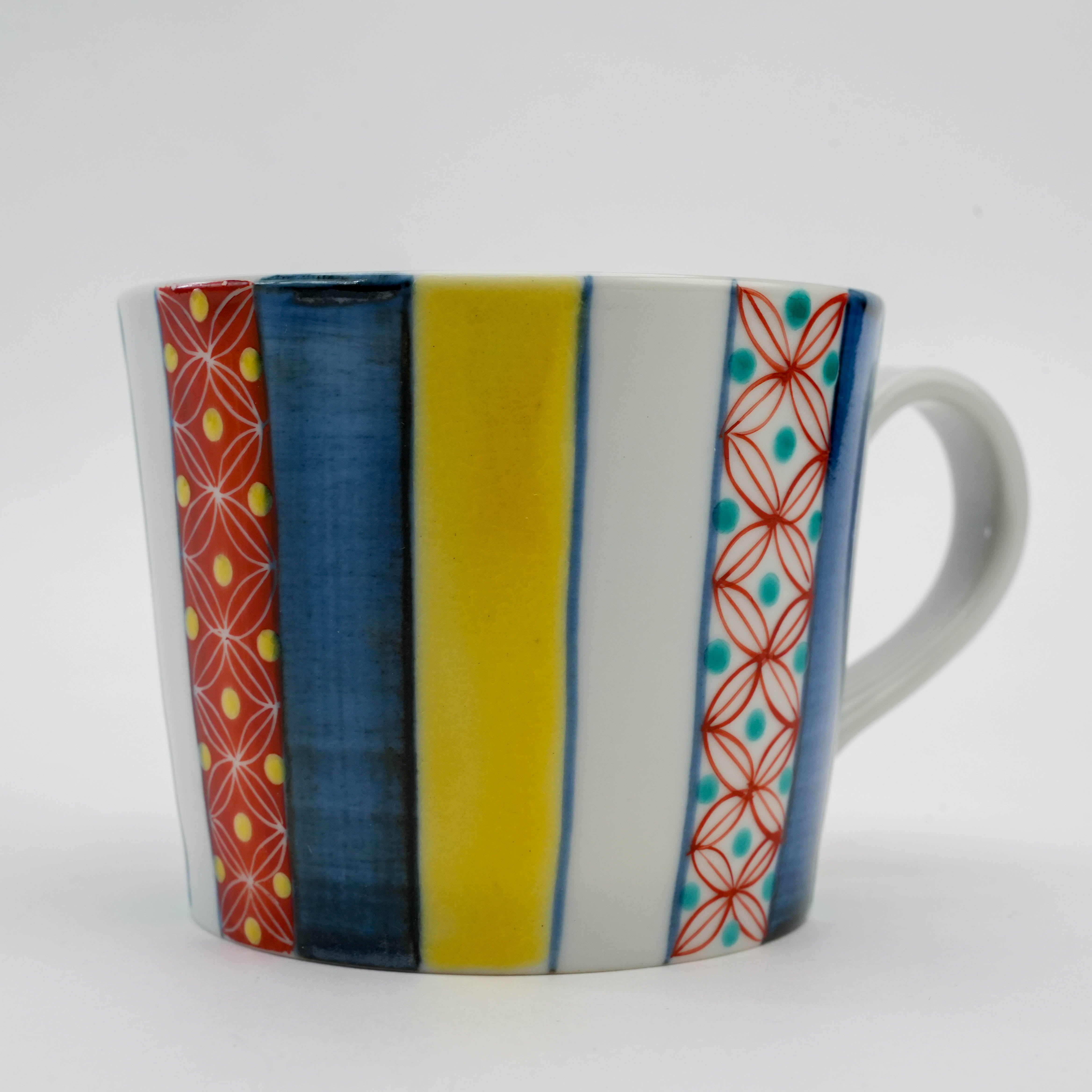 Close-up of Kutani Stripe Mug showcasing detailed komon motifs and vivid hand-painted stripes. Unique Japanese ceramic mug for gifting.