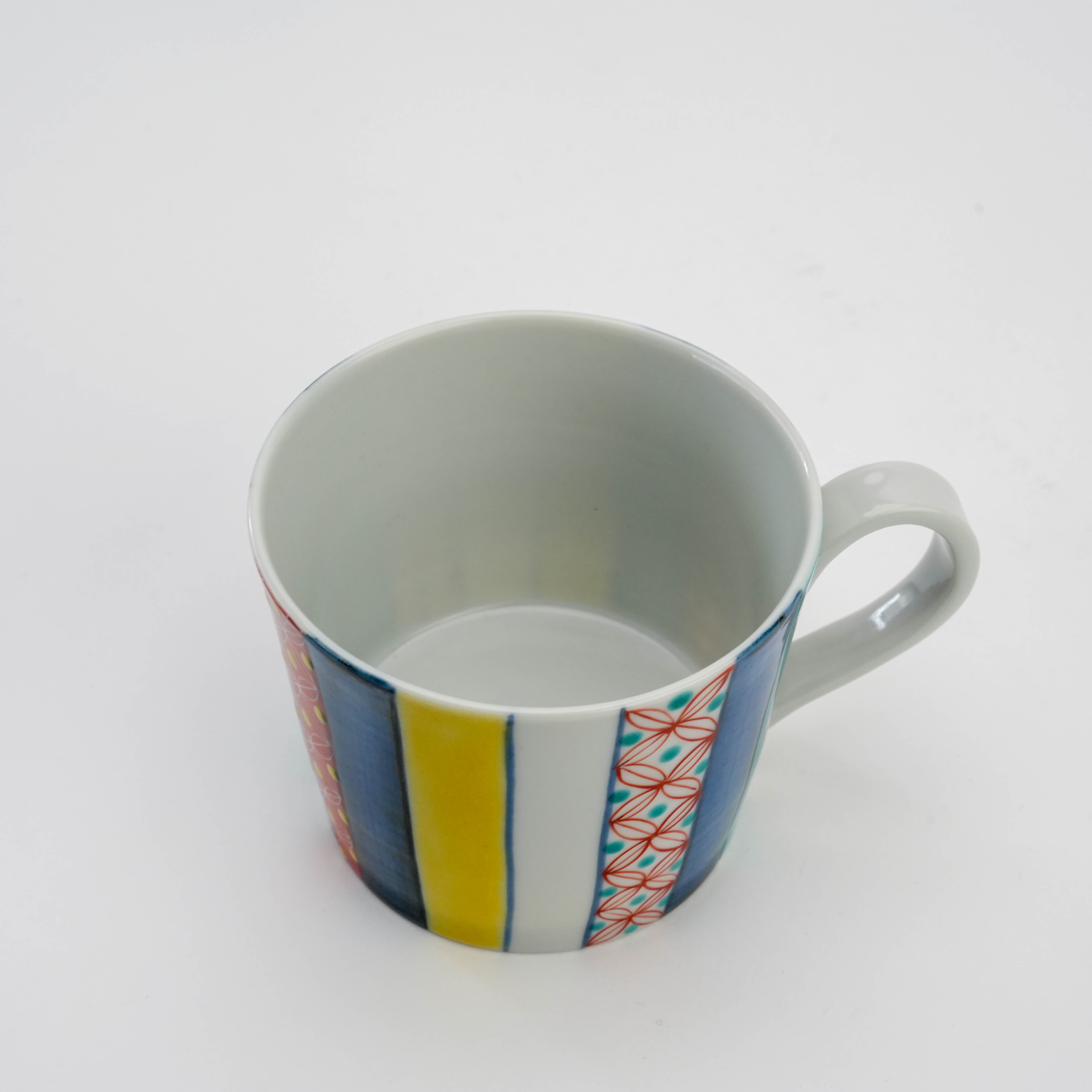 Top view of Kutani Komon Mug with smooth interior and vibrant exterior design. Japanese handcrafted mug for modern drinkware sets.