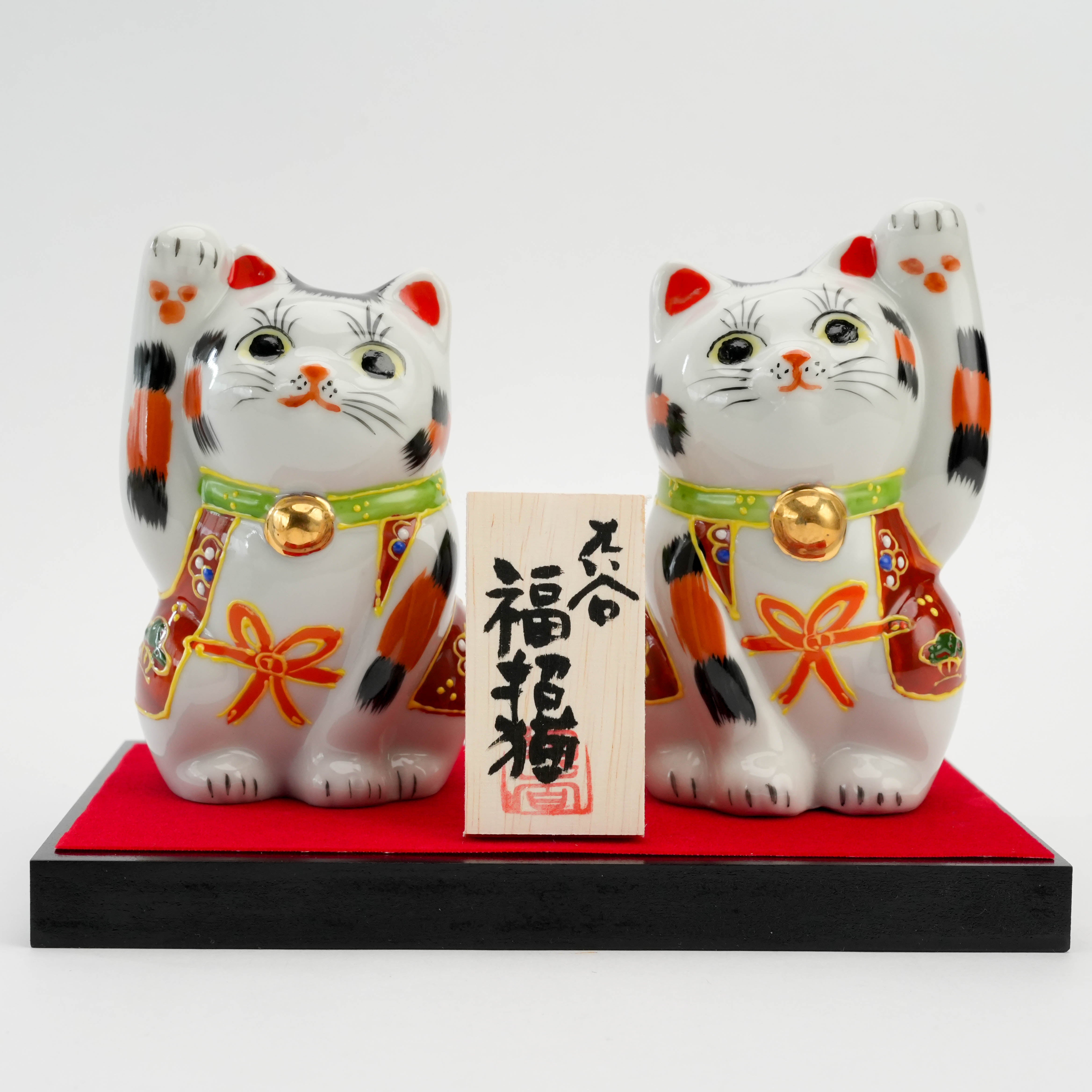 Front view of Kutani Calico Lucky Cats - Custom Cat Ornament pair with Japanese plaque, representing traditional charm and prosperity in decor.