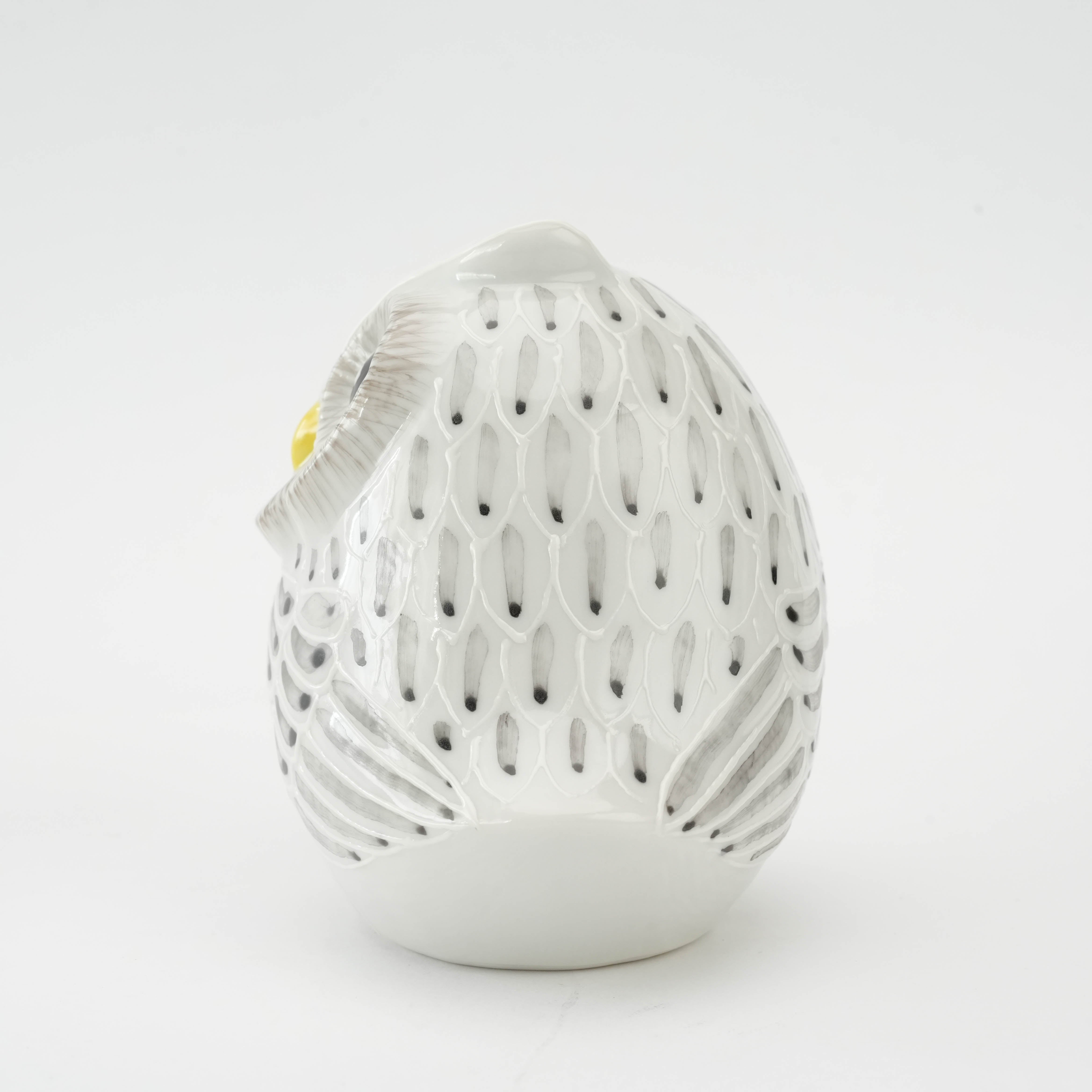 Back view of Kutani Owl Figurine showcasing detailed craftsmanship and symmetrical feather etching. Adds charm to any decorative setting.