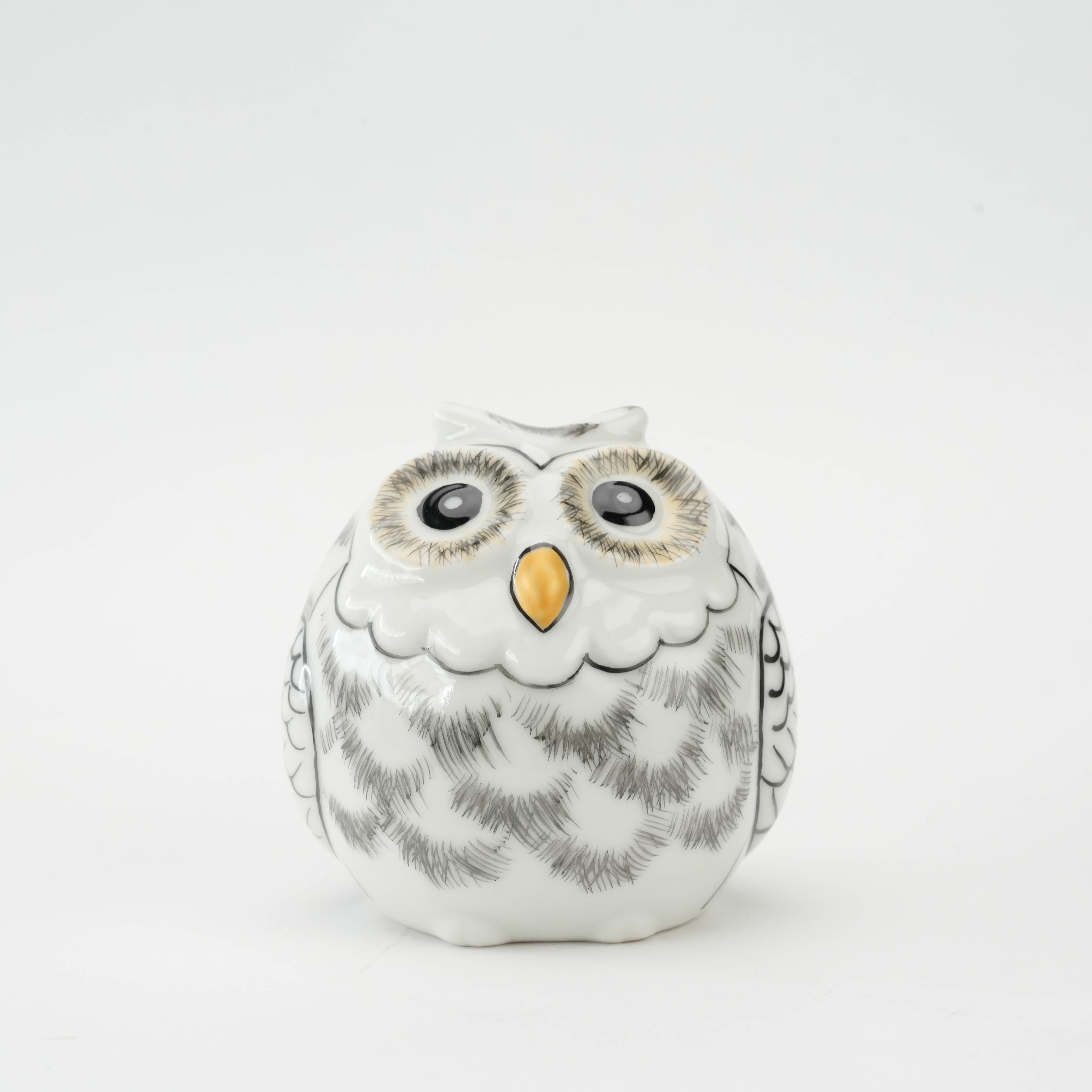 Front view of Kutani Owl Figurine with detailed grey feather strokes and a glossy golden beak, ideal for adding symbolic elegance to interiors.