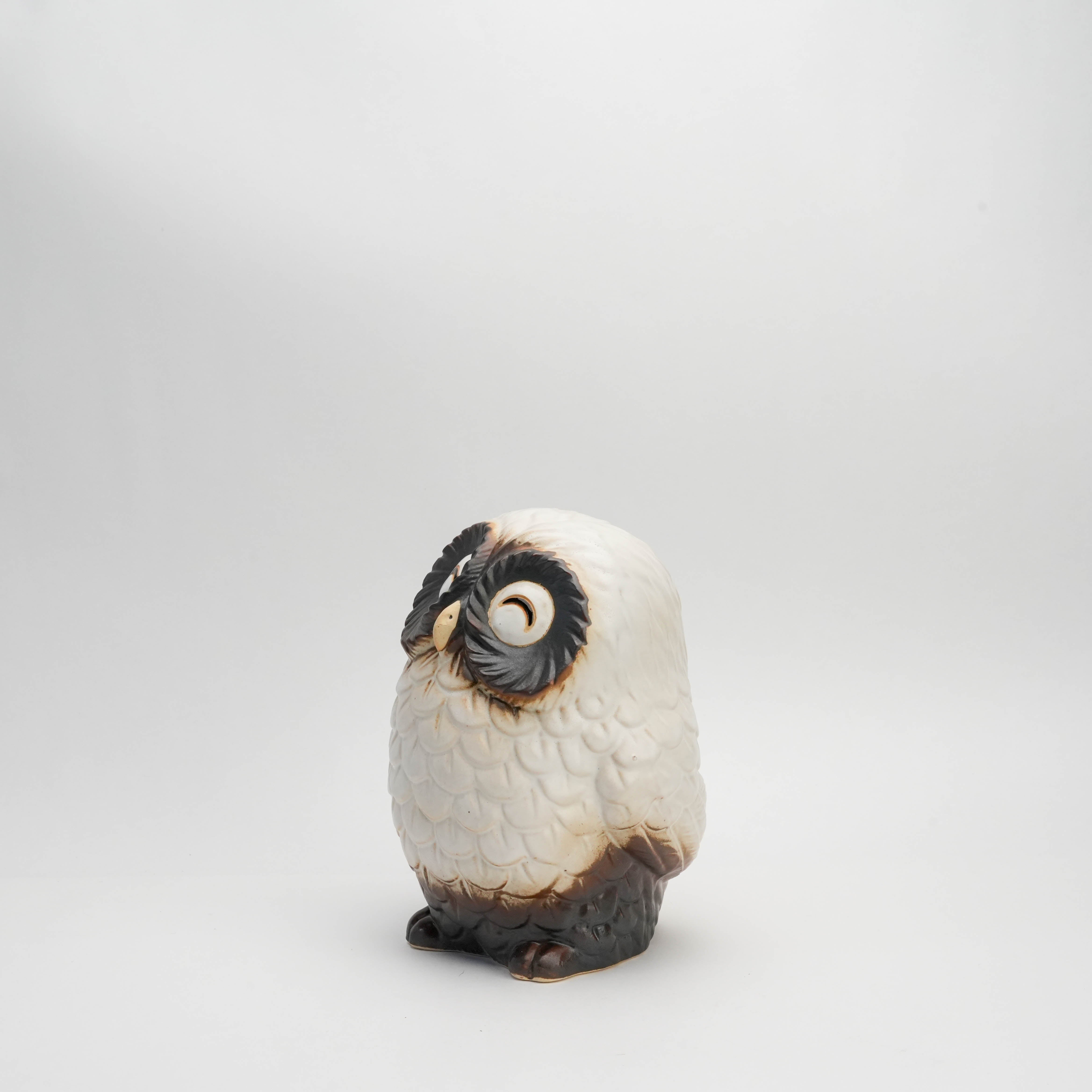 Angled view of large White Owl Ornament - Smiling Shigaraki, highlighting its detailed ceramic design and charming holiday appeal.