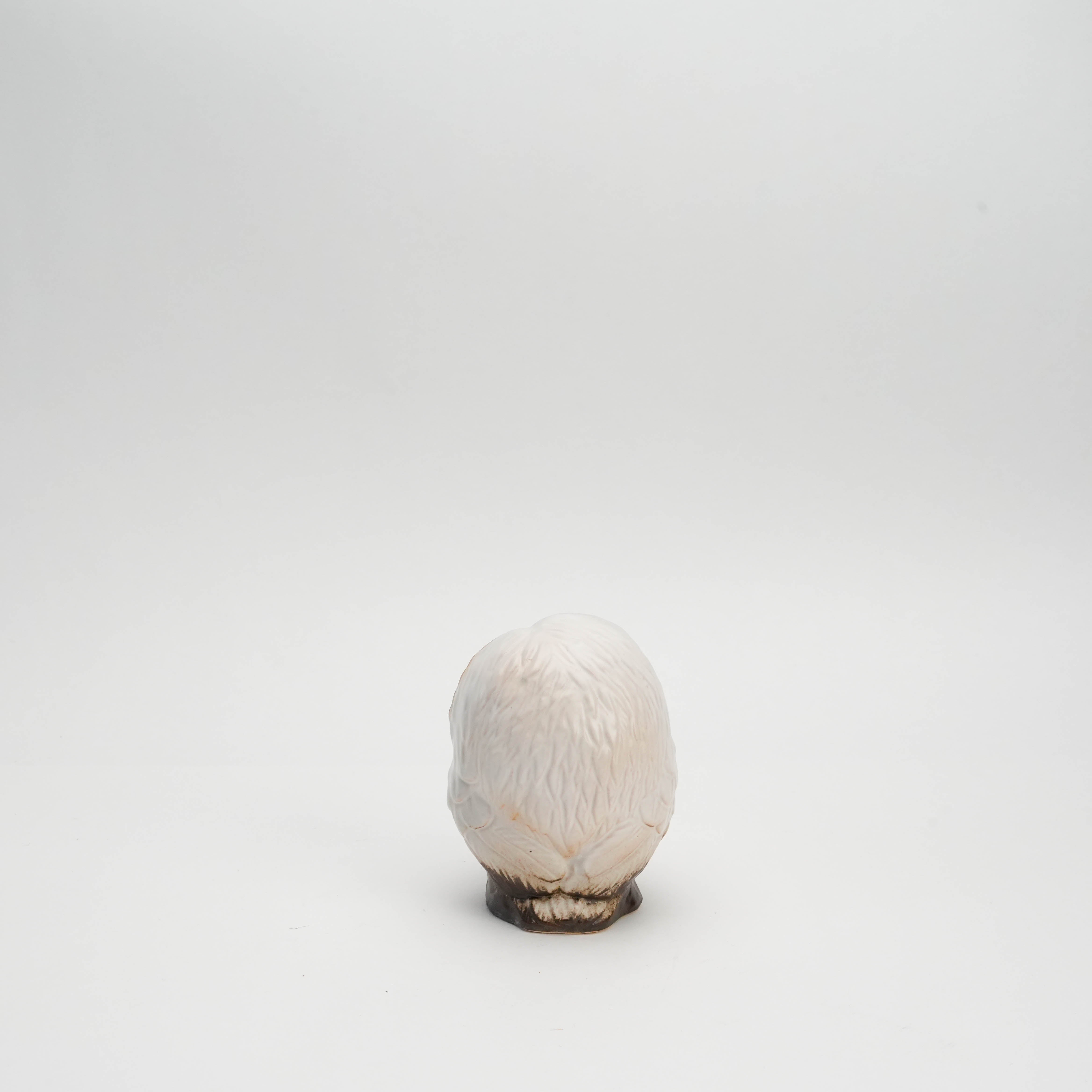 Rear view of small handcrafted Shigaraki Ware white owl ornament, showing detailed feather sculpting and smooth ceramic finish.