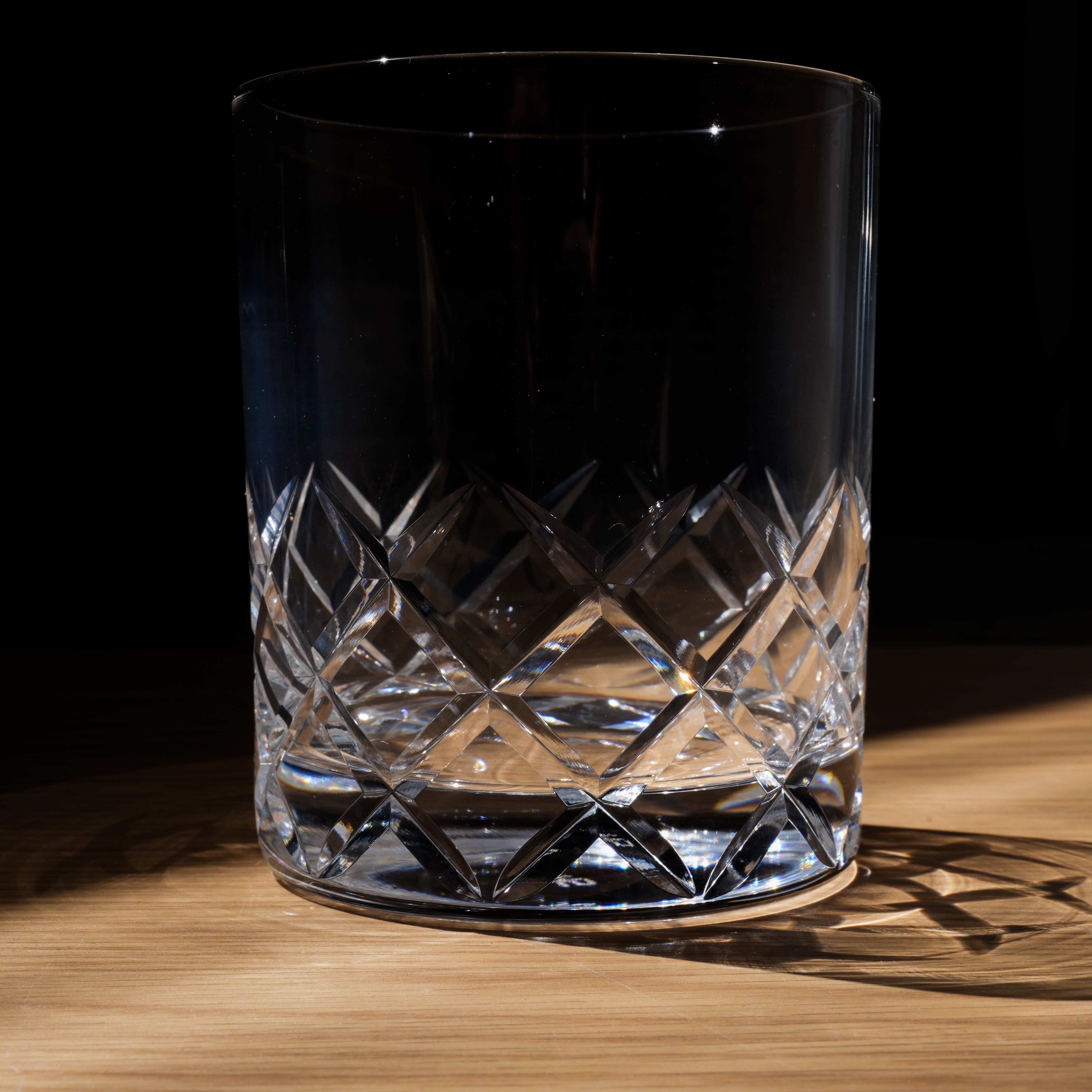 Close-up of Toyo-Sasaki HS Yarai Cut Whiskey Rock Glass showcasing detailed Japanese cut pattern and crystal clarity for premium drinkware appeal.
