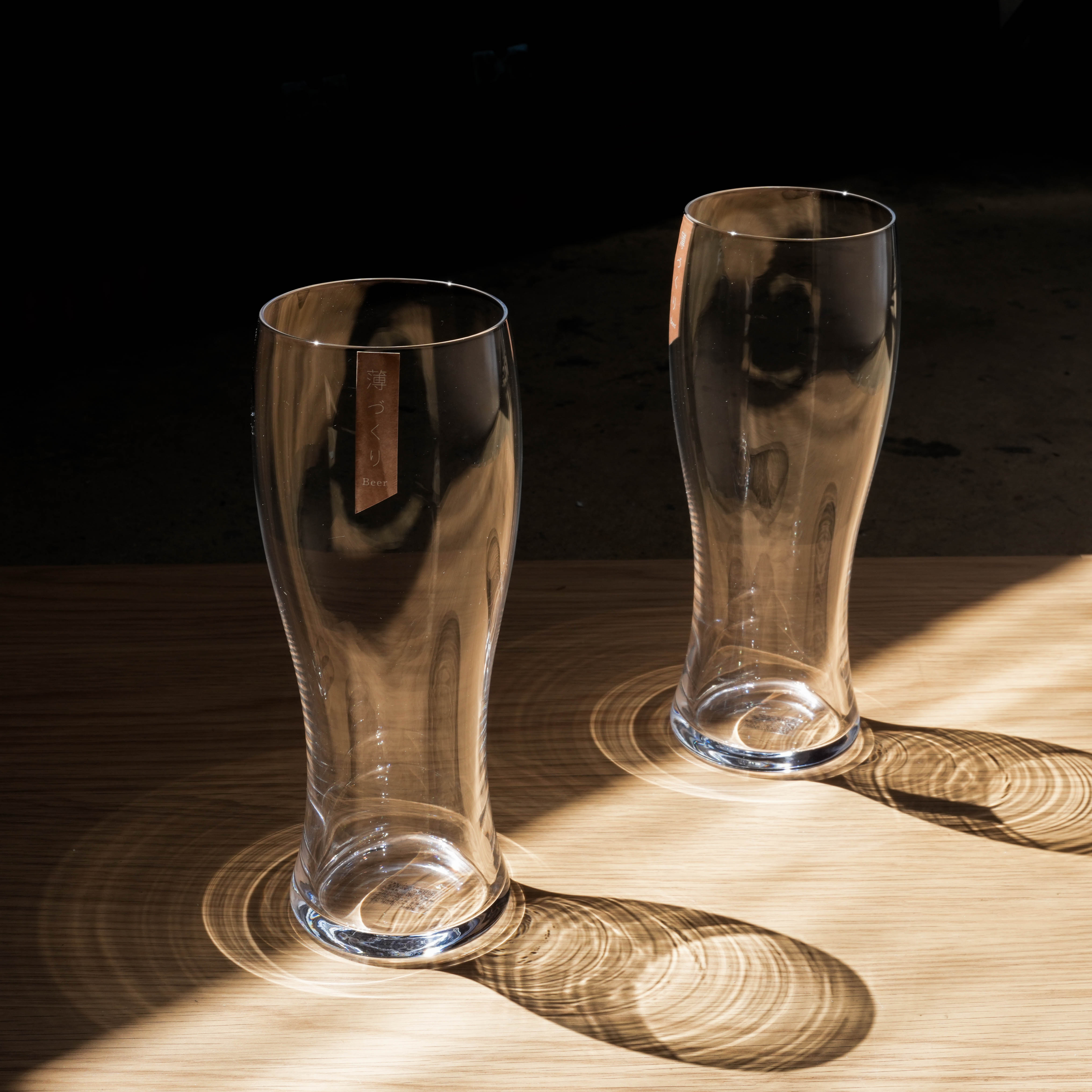 Toyo-Sasaki Beer Glass Set - Usurai Gift Set featuring two tall, clear beer glasses with elegant curves, ideal for enhancing beer aroma.