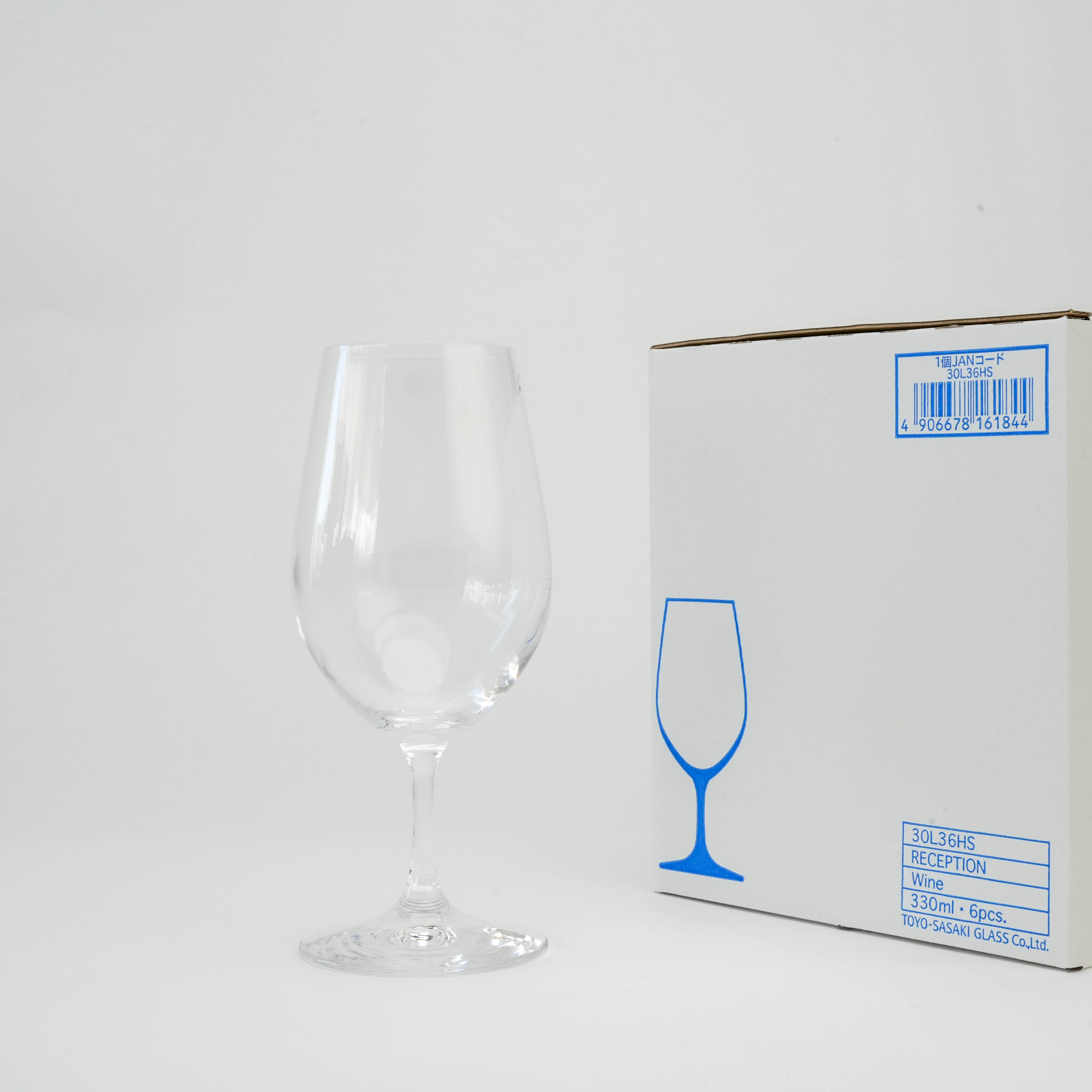 Toyo-Sasaki Wine Glass Set - HS Durable 330ml wine glass beside branded box, perfect for stylish and durable drinkware collections.