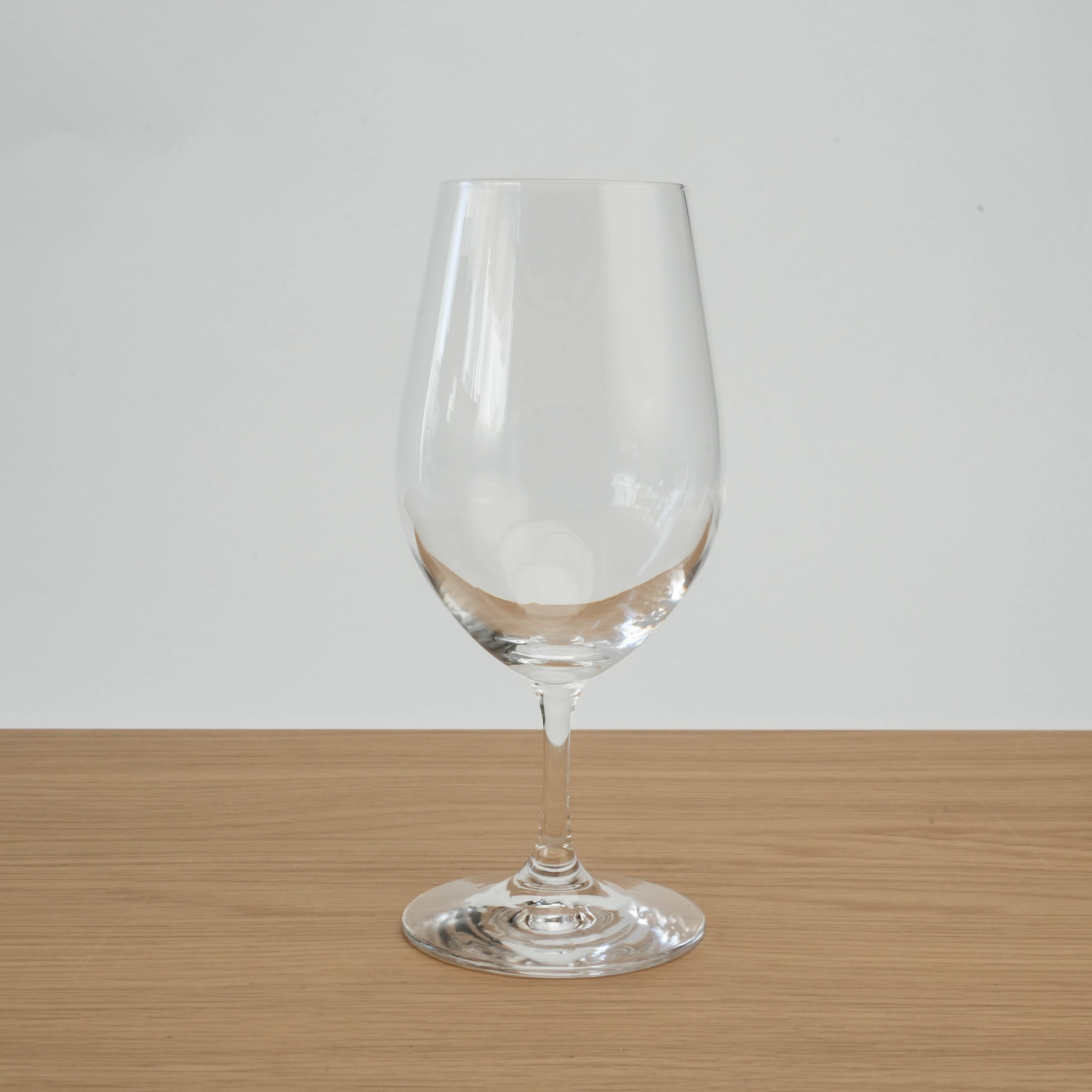 Toyo-Sasaki Wine Glass Set - HS Durable single wine glass with elegant stem, ideal for home or restaurant wine service.