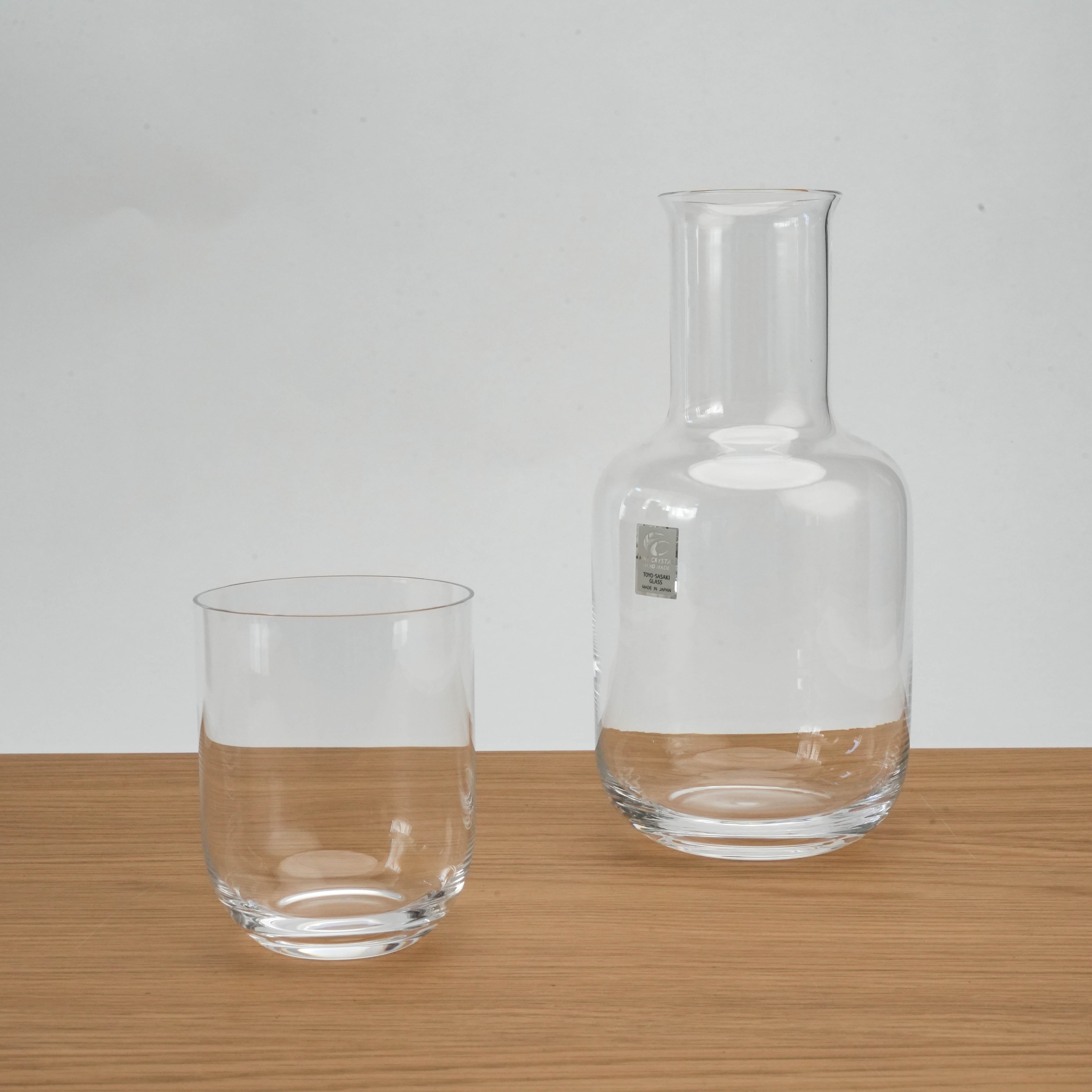 Toyo-Sasaki Night Carafe and matching glass cup set displayed on a wooden surface, ideal for home or office night use.