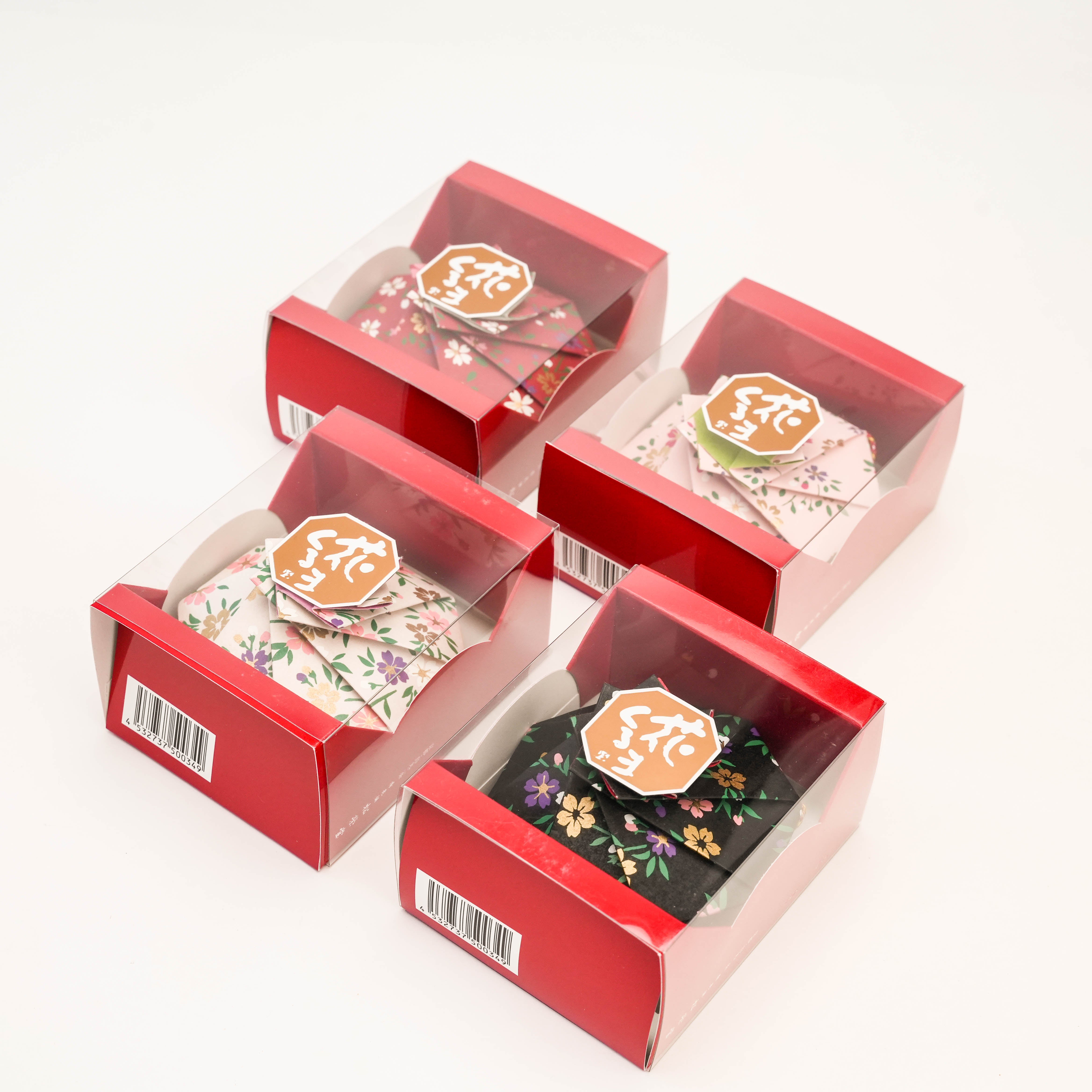 Set of four Shoyeido Sachet Flower Wheels in assorted floral origami designs, boxed for elegant home fragrance and decor.