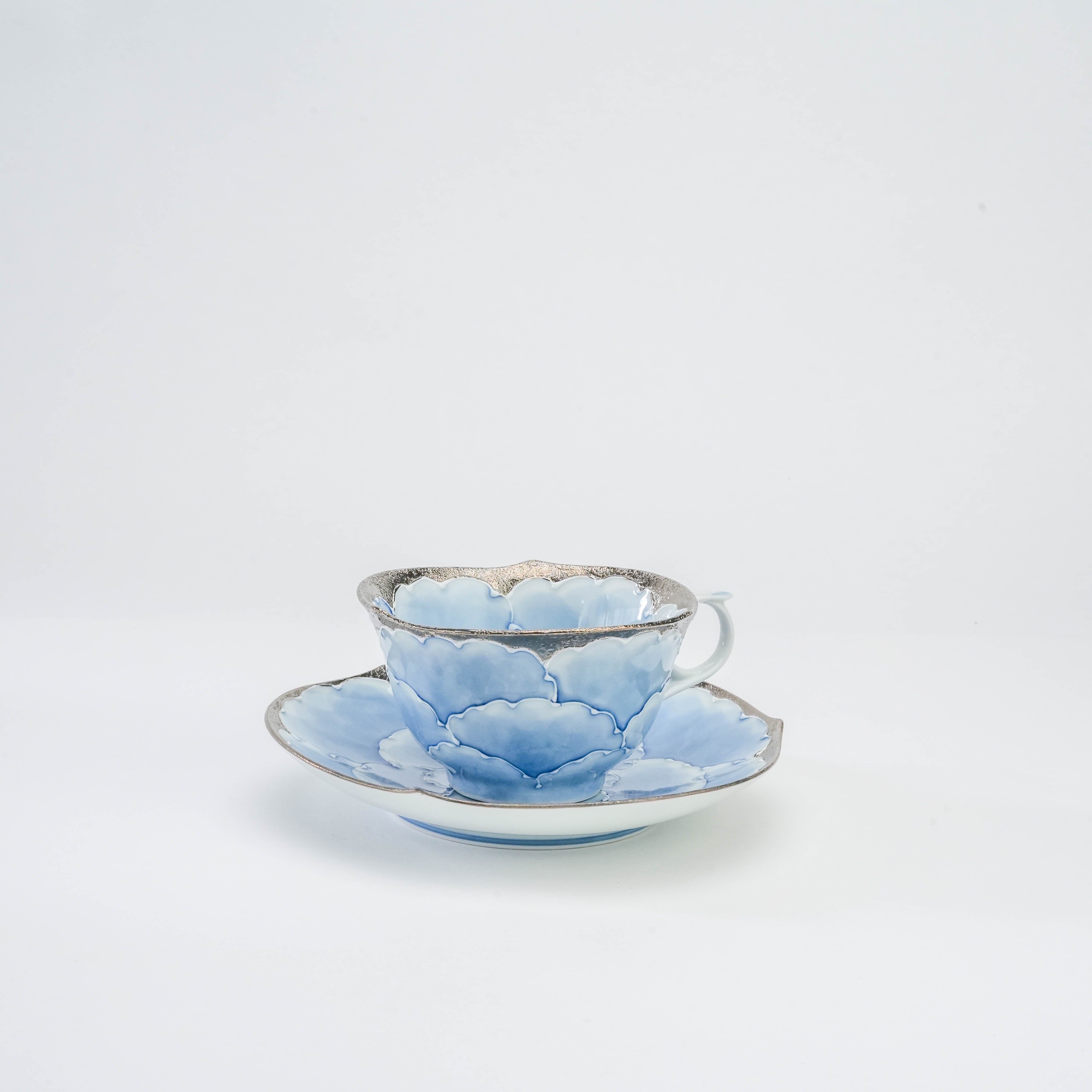 Bunzan Kiln Cup & Saucer - Peony Porcelain Set | Arita Ware featuring a blue hand-painted peony design with silver accents, ideal for tea service.