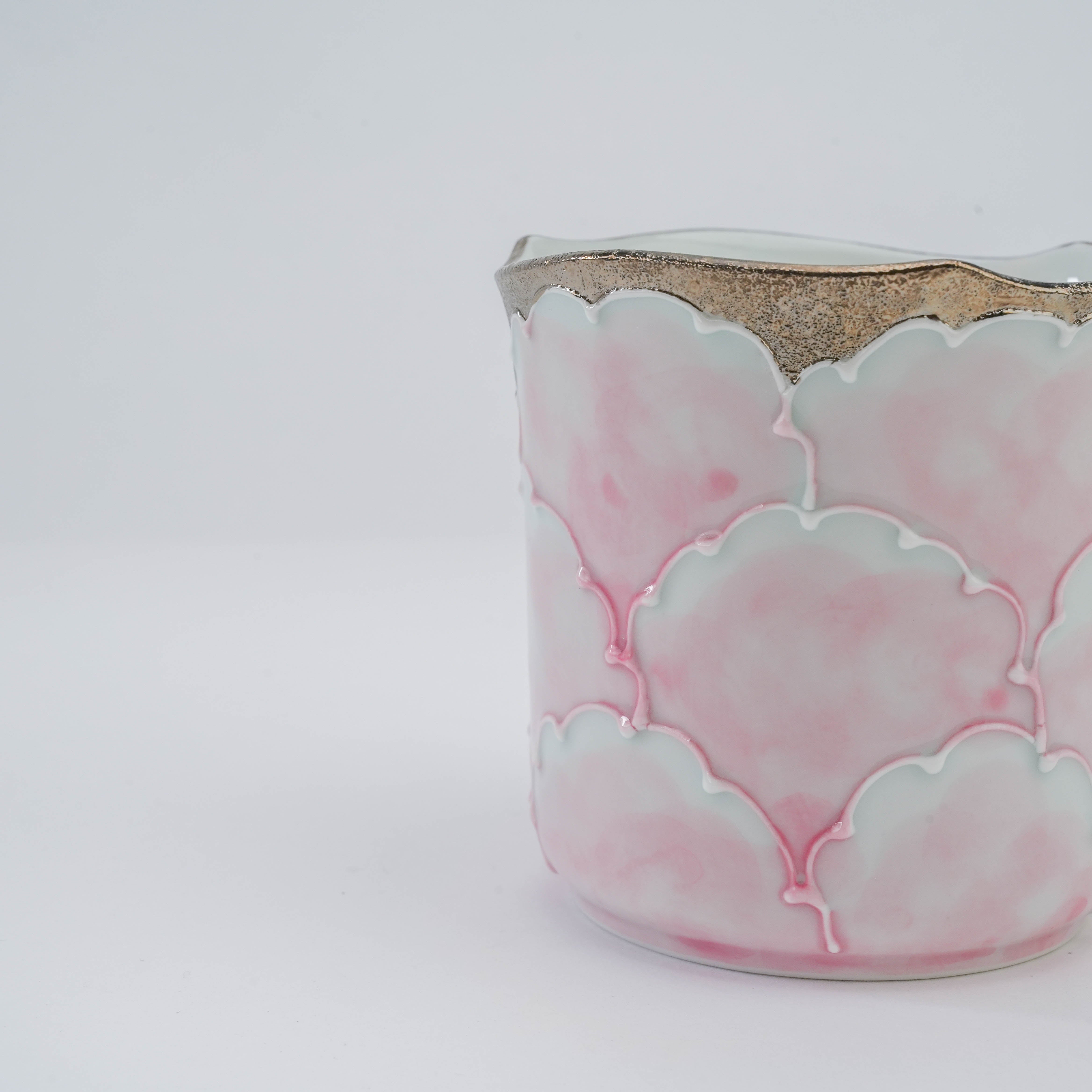 Detail of pink peony petal pattern and shimmering silver rim on Arita Peony Mug, a hand-painted porcelain piece from Bunzan Kiln.
