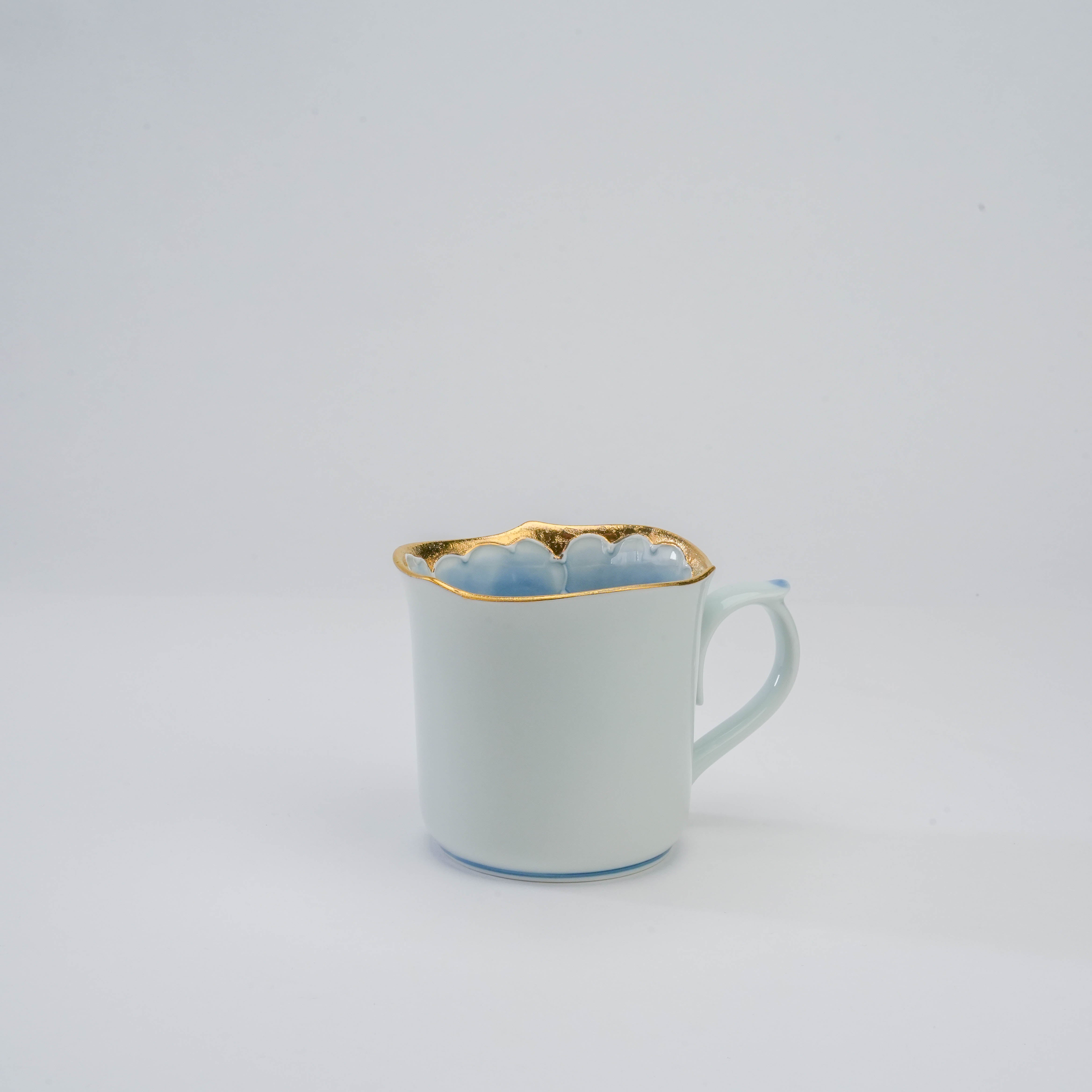 Arita Ware Peony Mug with elegant blue porcelain body and scalloped gold rim, showcasing refined craftsmanship from Bunzan Kiln.