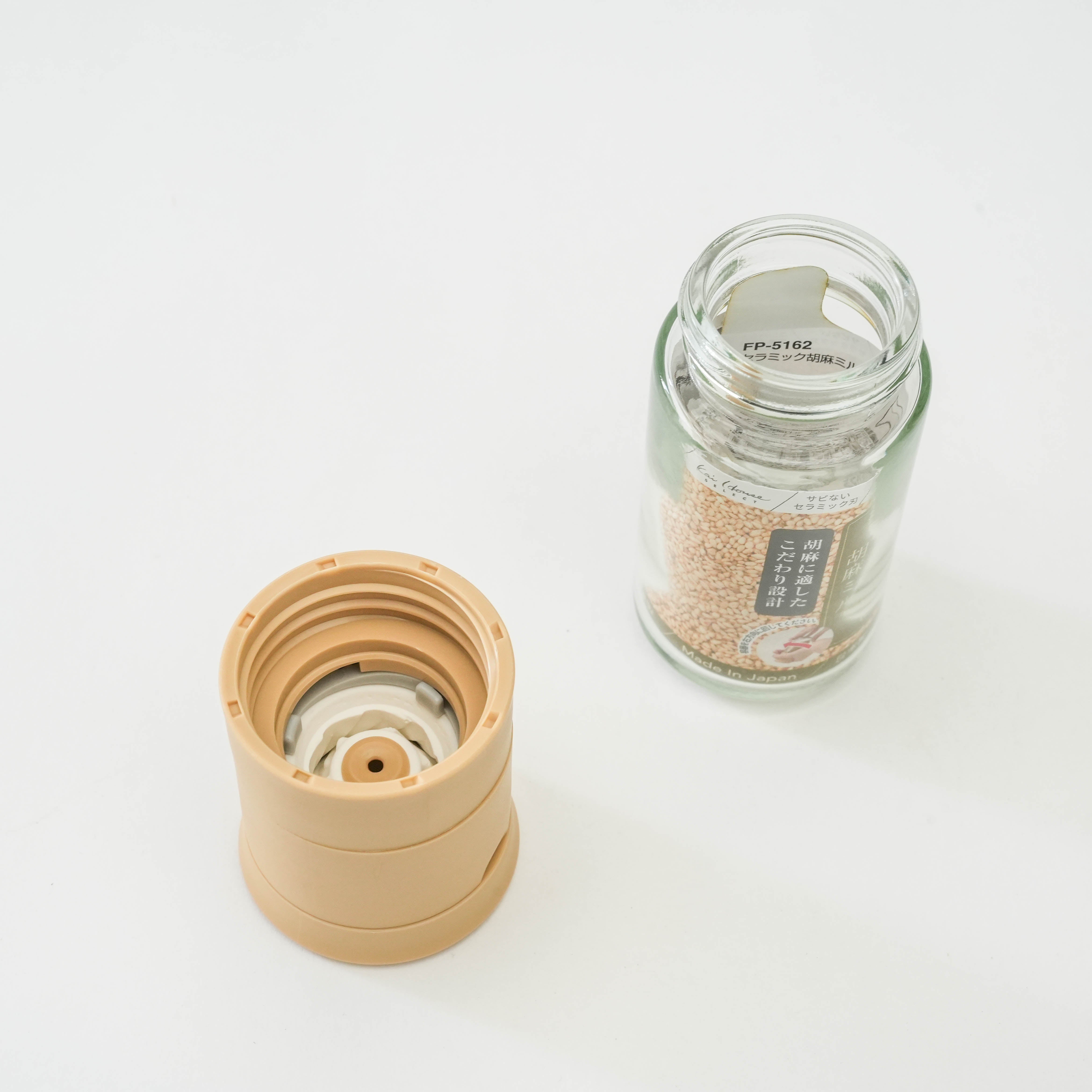 Open Kai Home Ceramic Sesame Grinder showing refillable glass jar and ceramic grinding mechanism, perfect for home kitchens.