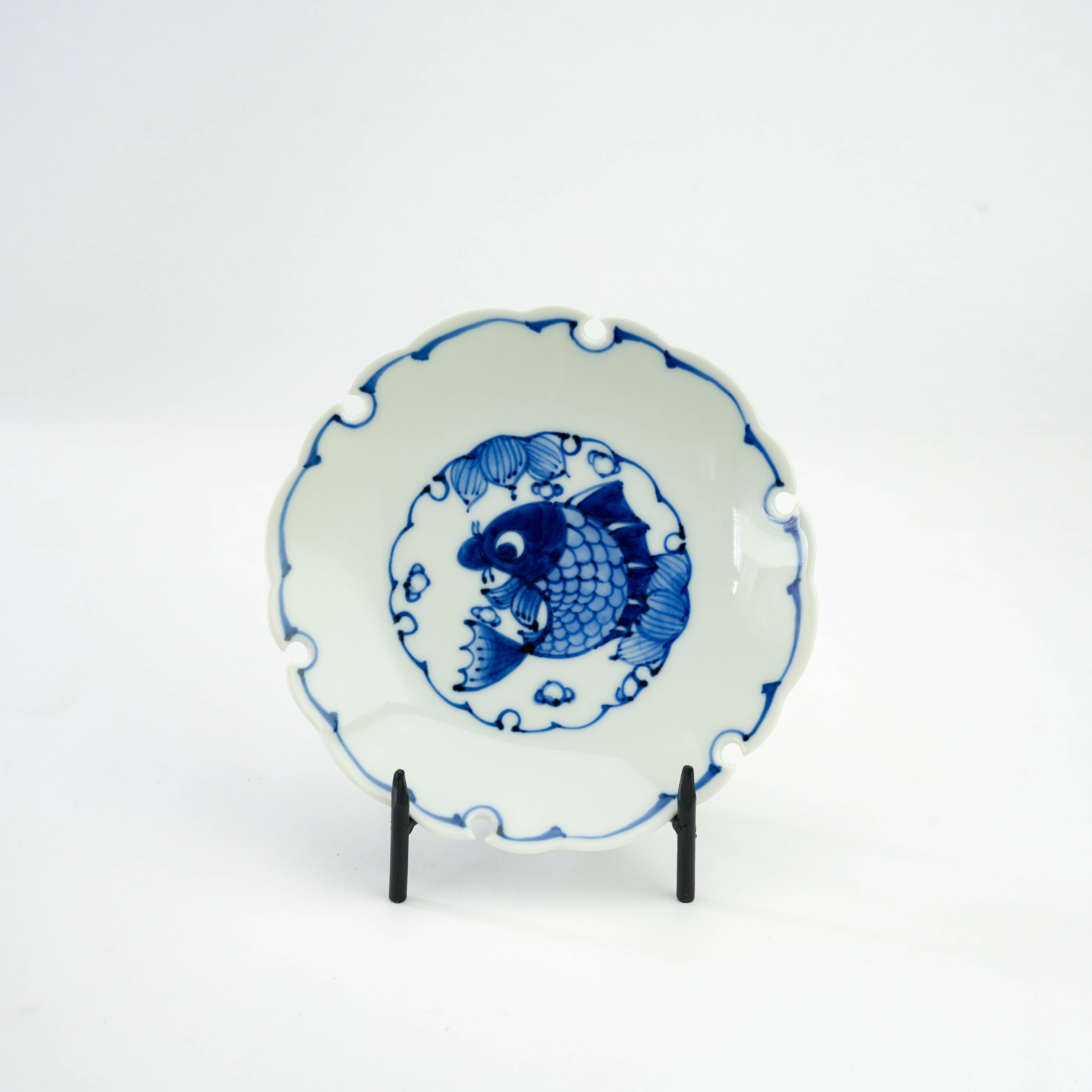 Arita Ware Snow Circle Plate - Fish Plate with hand-painted blue fish design and scalloped edge, ideal for desserts or decorative display.