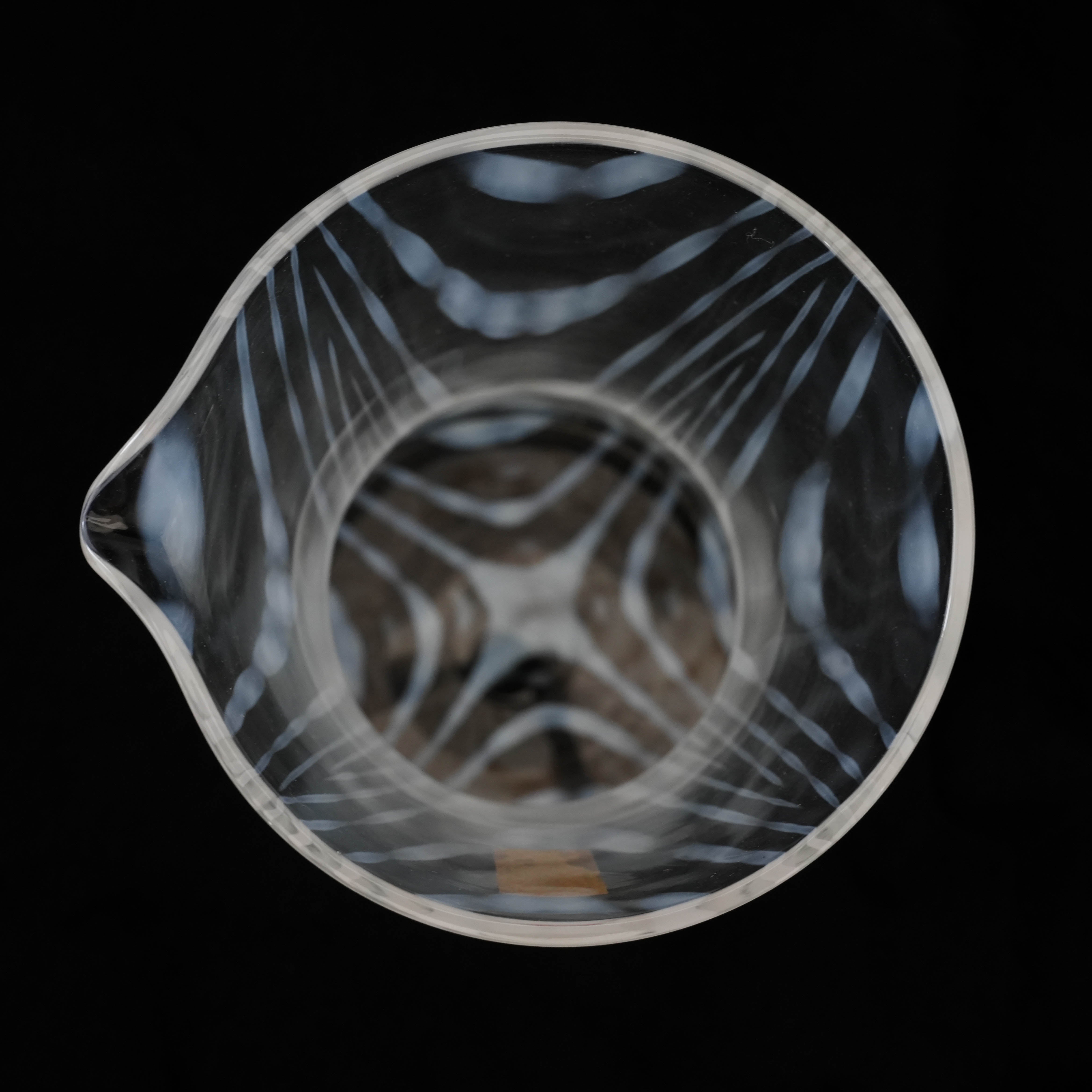 Top-down view of the Hirota Glass Taisho Roman Carafe - Winding, showing the symmetrical interior pattern and wide opening for easy pouring.