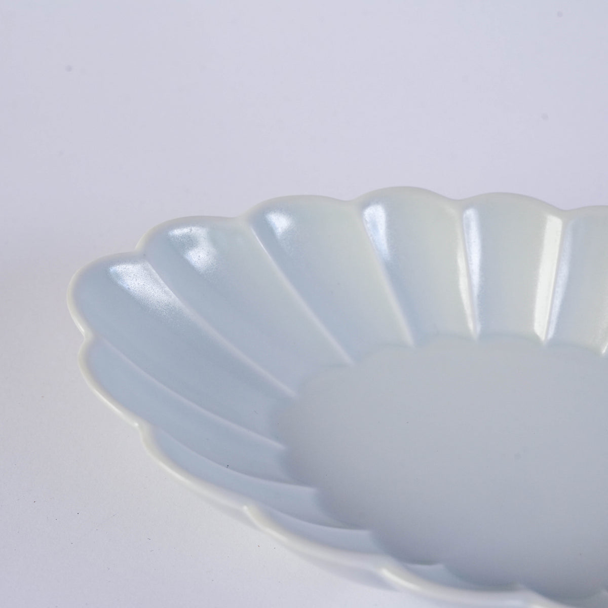 Light blue carved oval plate with floral motif, ceramic, ideal for serving, SKU: NPSF1010