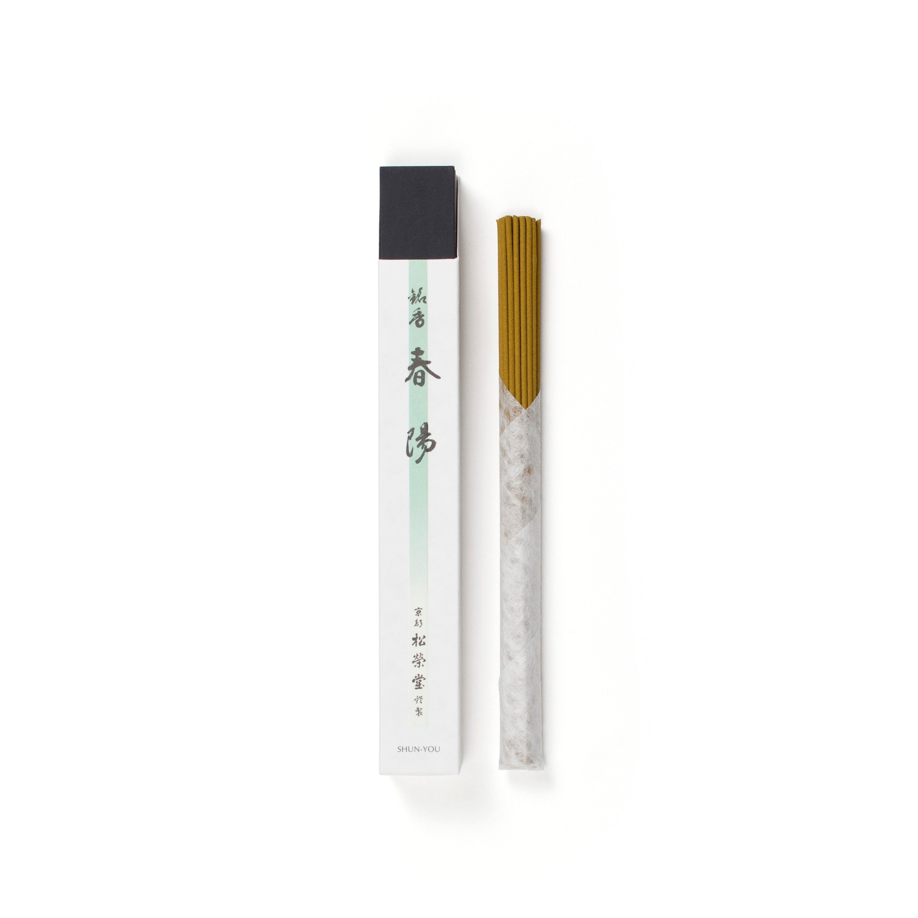 Unboxed Shoyeido Shunyou Premium Incense sticks beside elegant packaging, featuring a blend of agarwood, florals, and spices for spring ambiance.