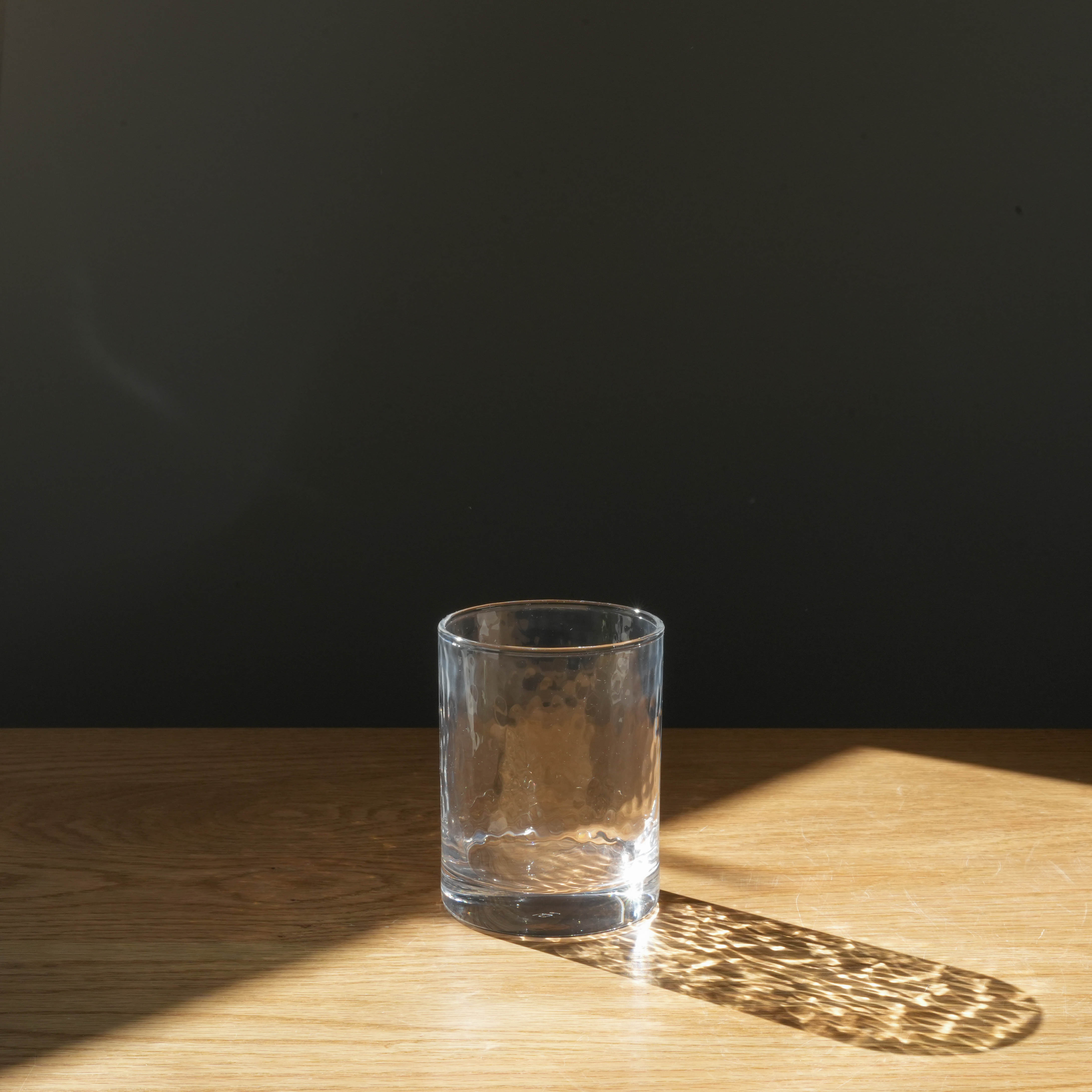 Toyo-Sasaki HS Colorful Life tumbler with textured glass design on wooden surface, showcasing Japanese craftsmanship and thin, durable drinkware.