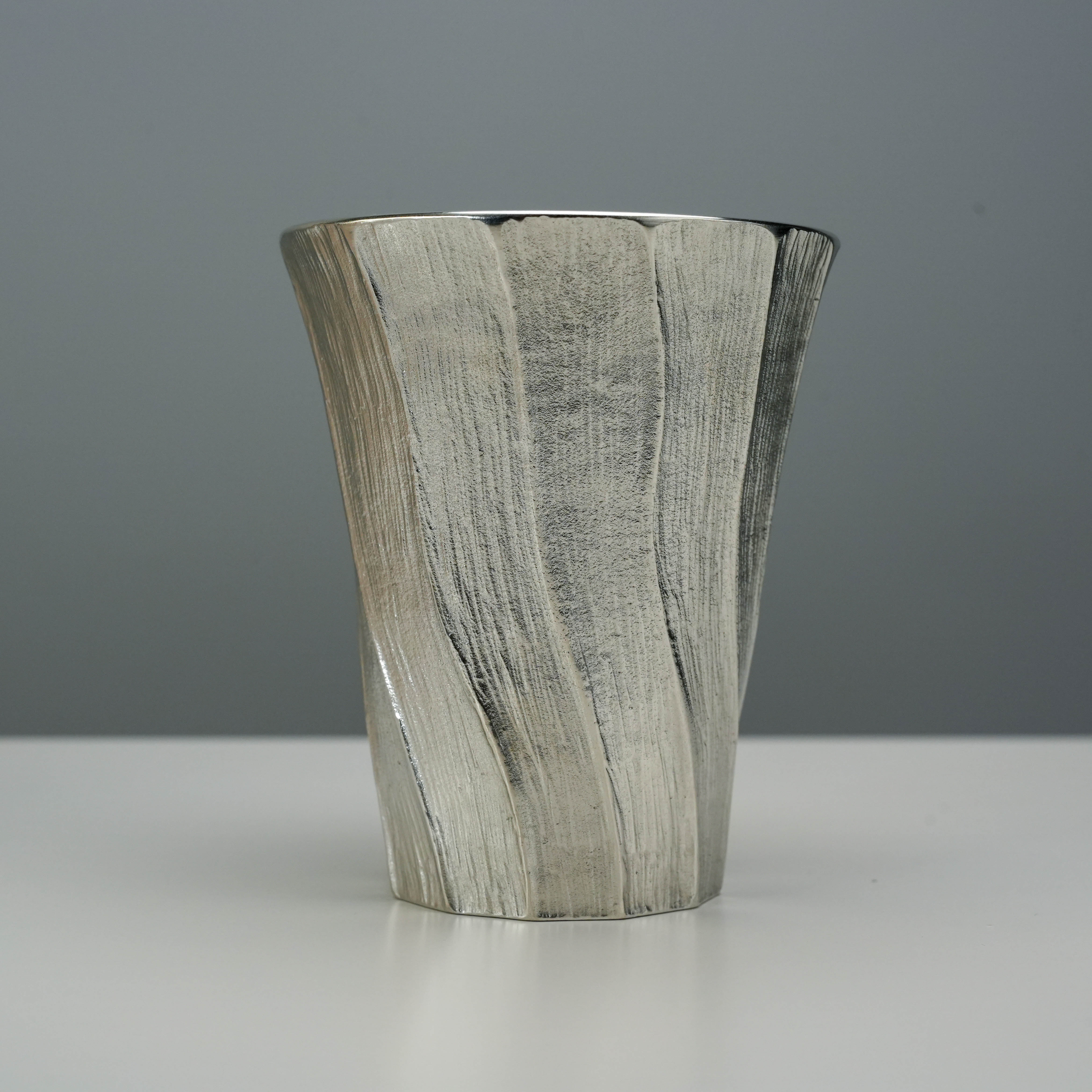 Close-up of Osaka Suzuki Tinware Fukayama Tumbler showing its handcrafted brushed tin finish and elegant flared shape.