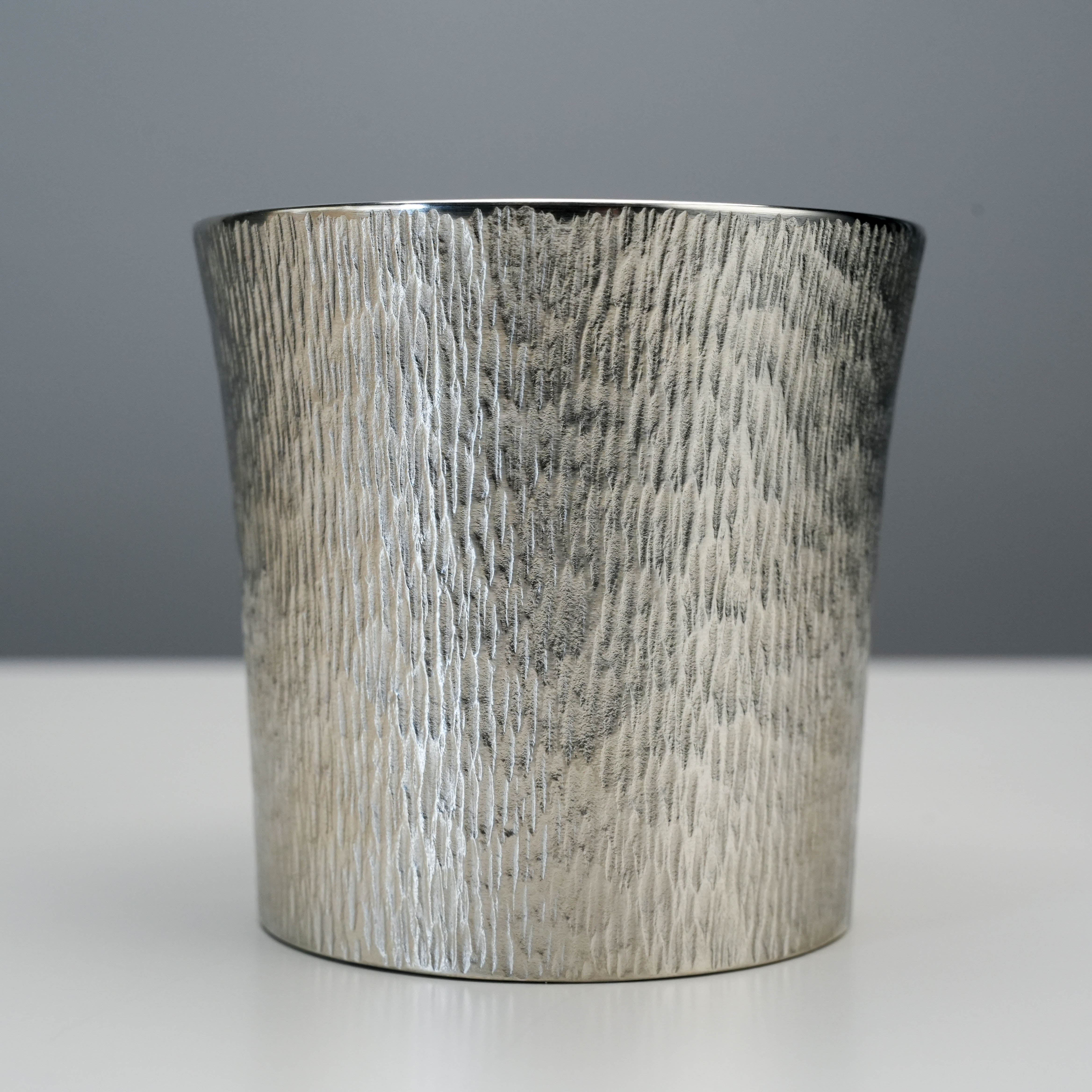Close-up of the Osaka Suzuki Tinware Funnel Tumbler showcasing its intricate hand-carved texture and premium tin craftsmanship.