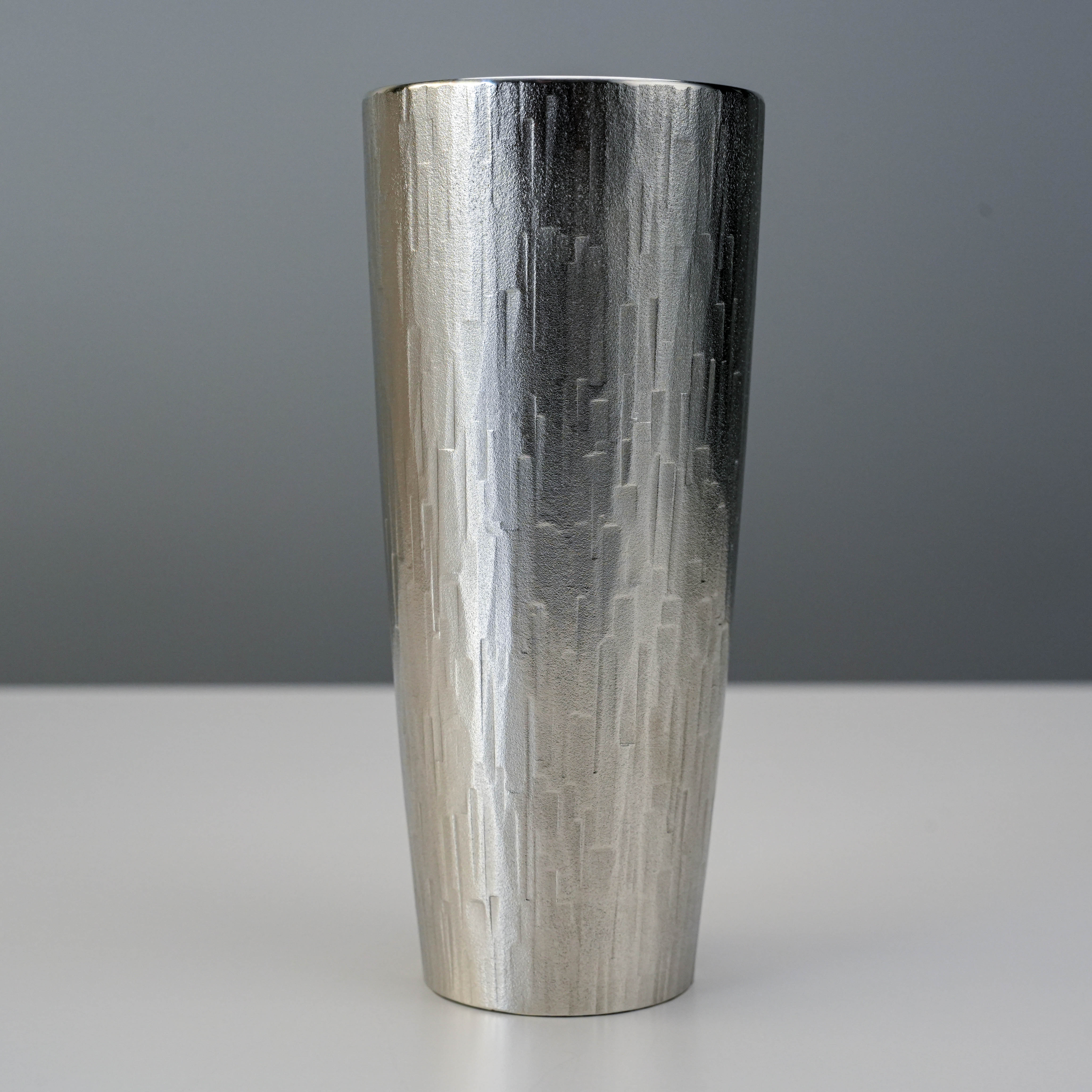 Close-up of the Osaka Suzuki Tinware Tumbler showcasing its intricate hand-carved tin surface and elegant Japanese craftsmanship.