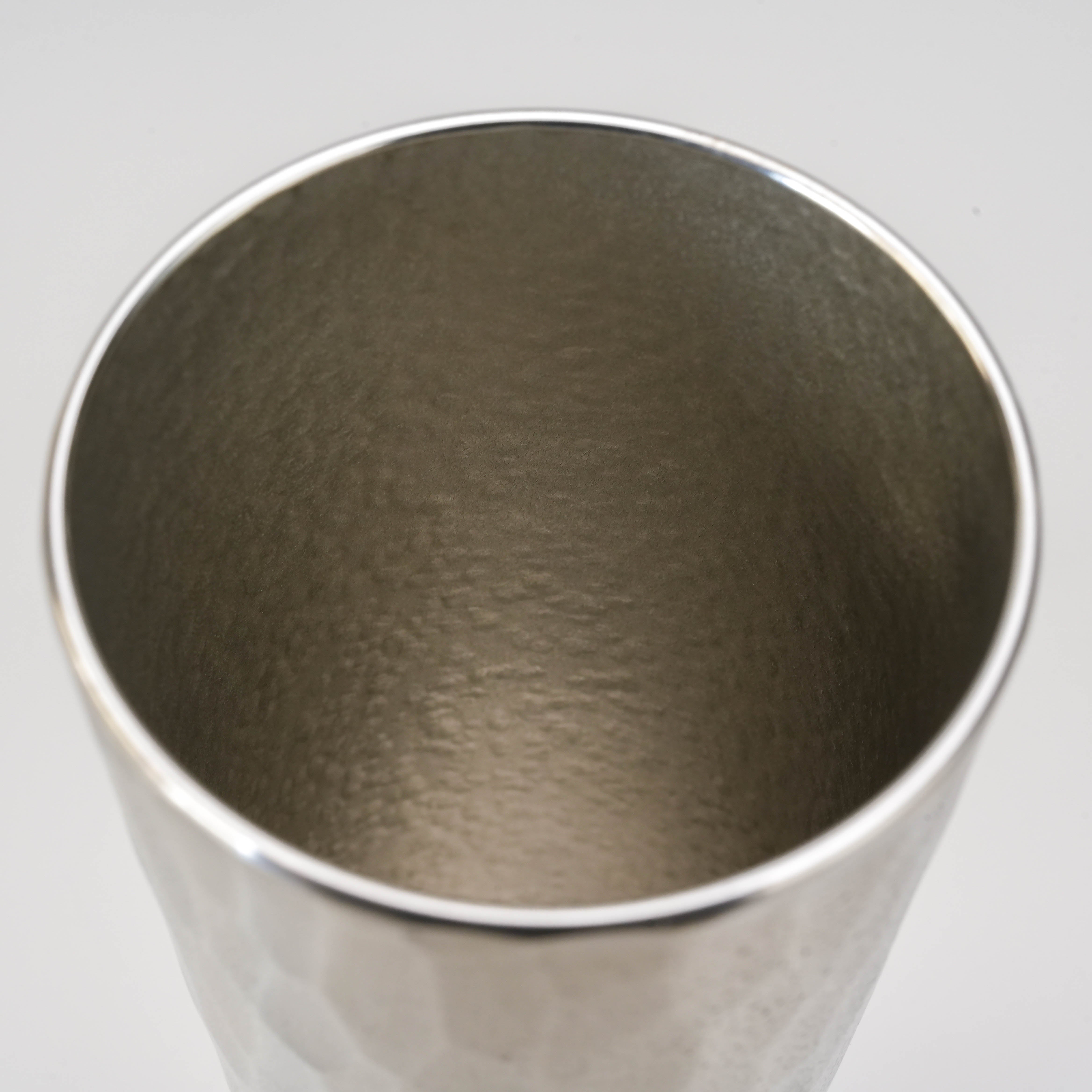 Interior view of the Osaka Suzuki Tinware Giero Moret Tumbler showing the fine hammered tin texture for a refined drinking experience.
