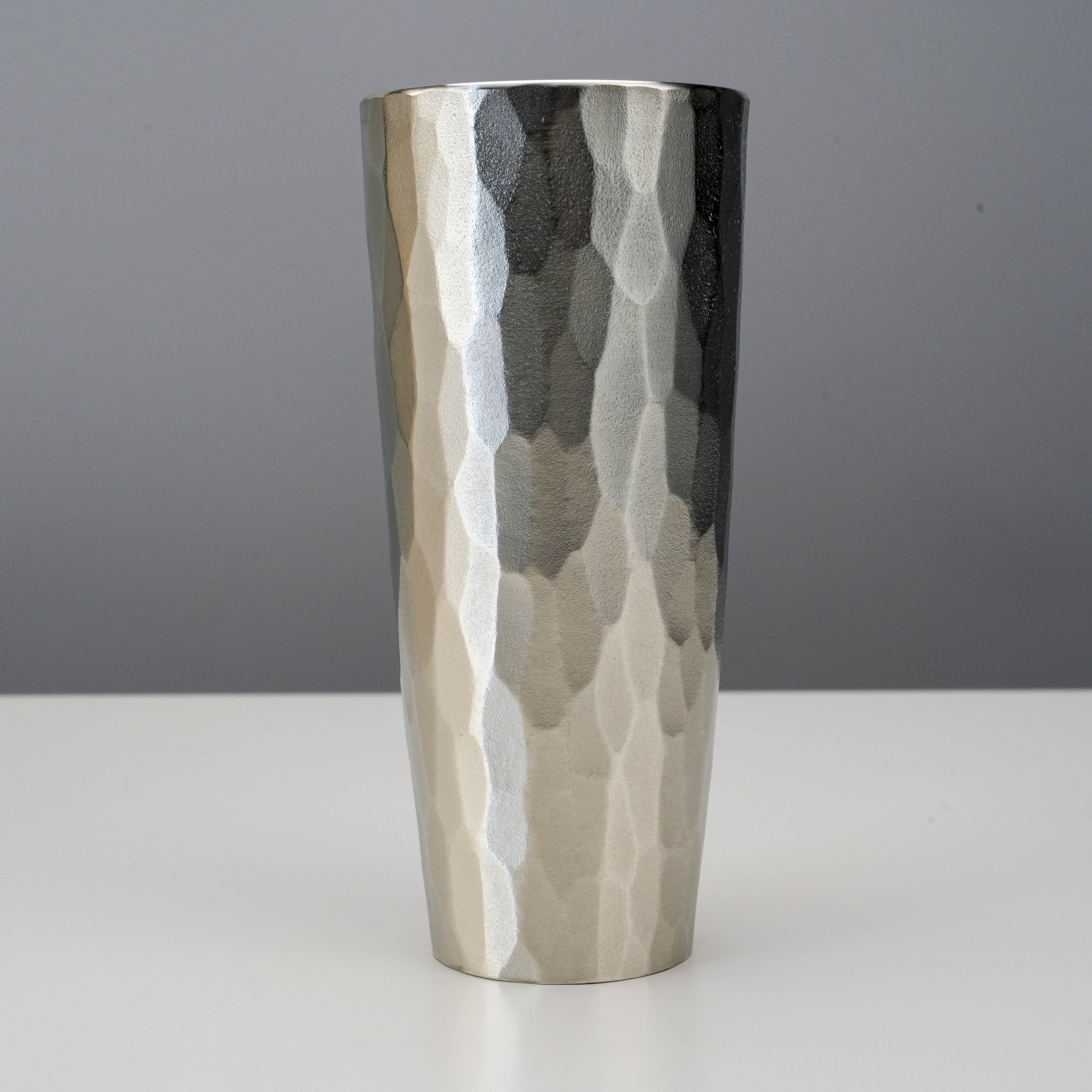 Close-up of Osaka Suzuki Tinware Giero Moret Tumbler highlighting its textured tin surface and elegant cylindrical shape.
