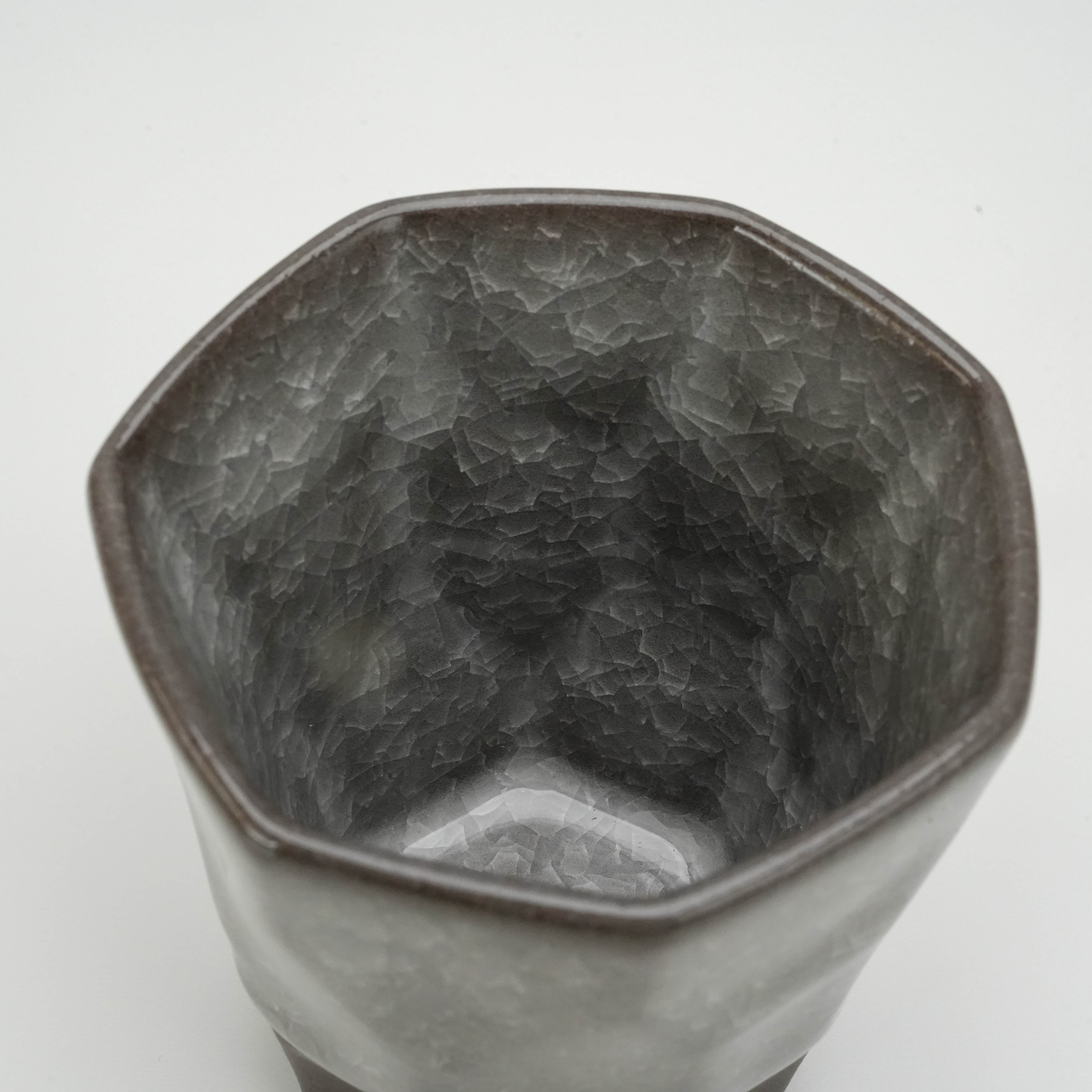 Top view of Tsubame Kobo Free Cup - Clay Craft Ice Crack showcasing intricate ice crack glaze pattern inside the 220ml black clay cup.