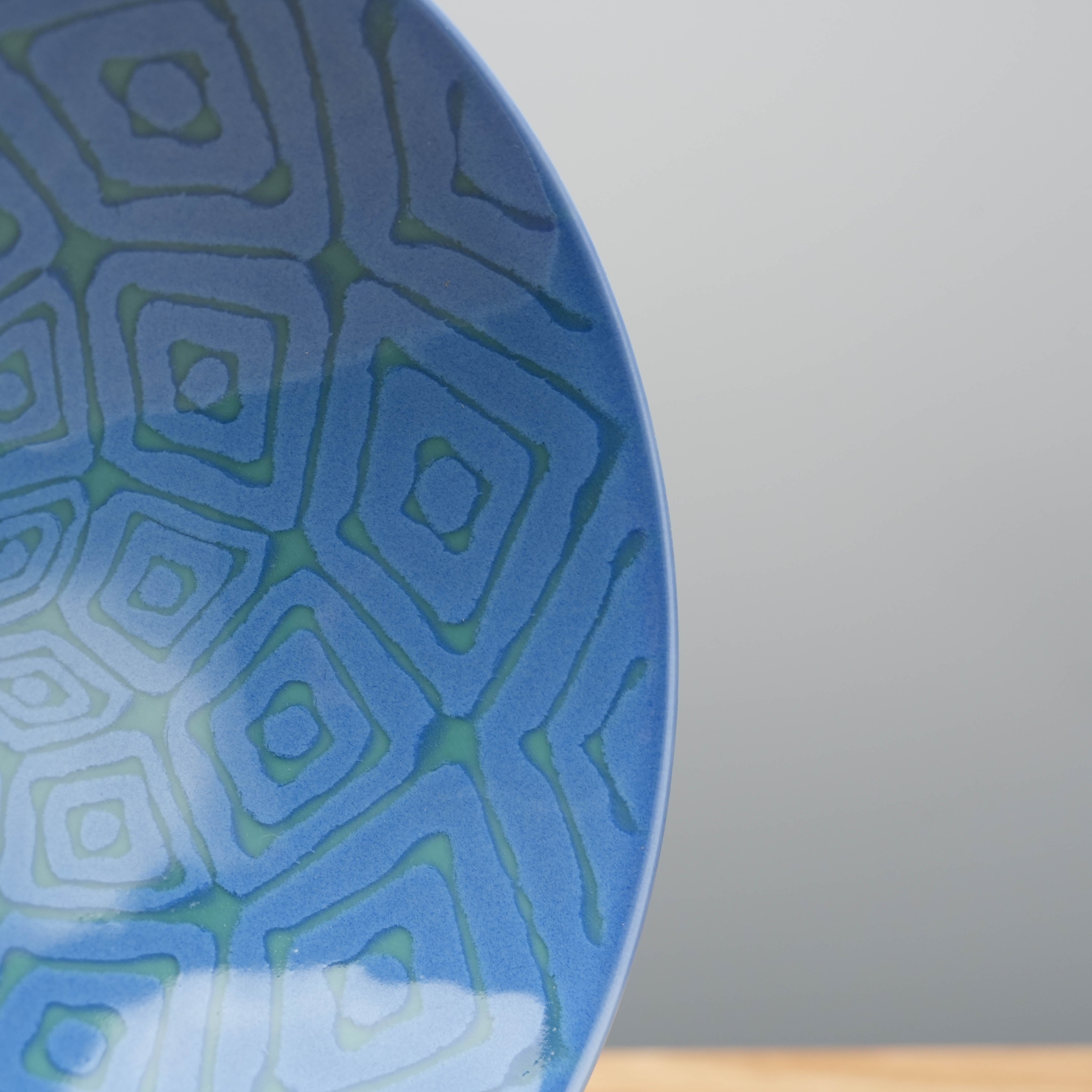 Detail of the Hasami Ware Hakusan Bowl's textured blue diamond motif, a decorative and functional piece for contemporary dining settings.