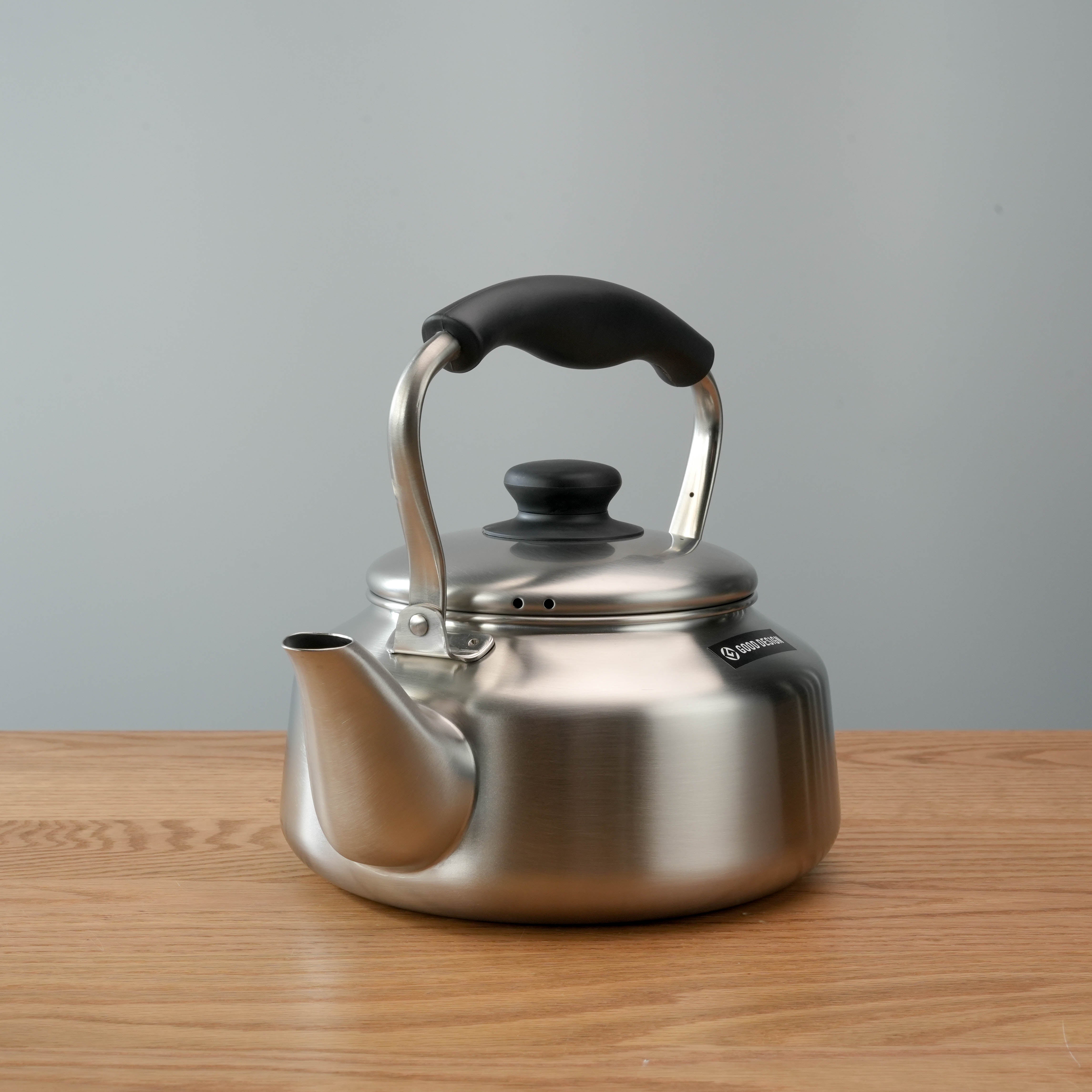 Side view of Sori Yanagi Stainless Steel Kettle showcasing its wide spout and durable matte stainless steel construction.