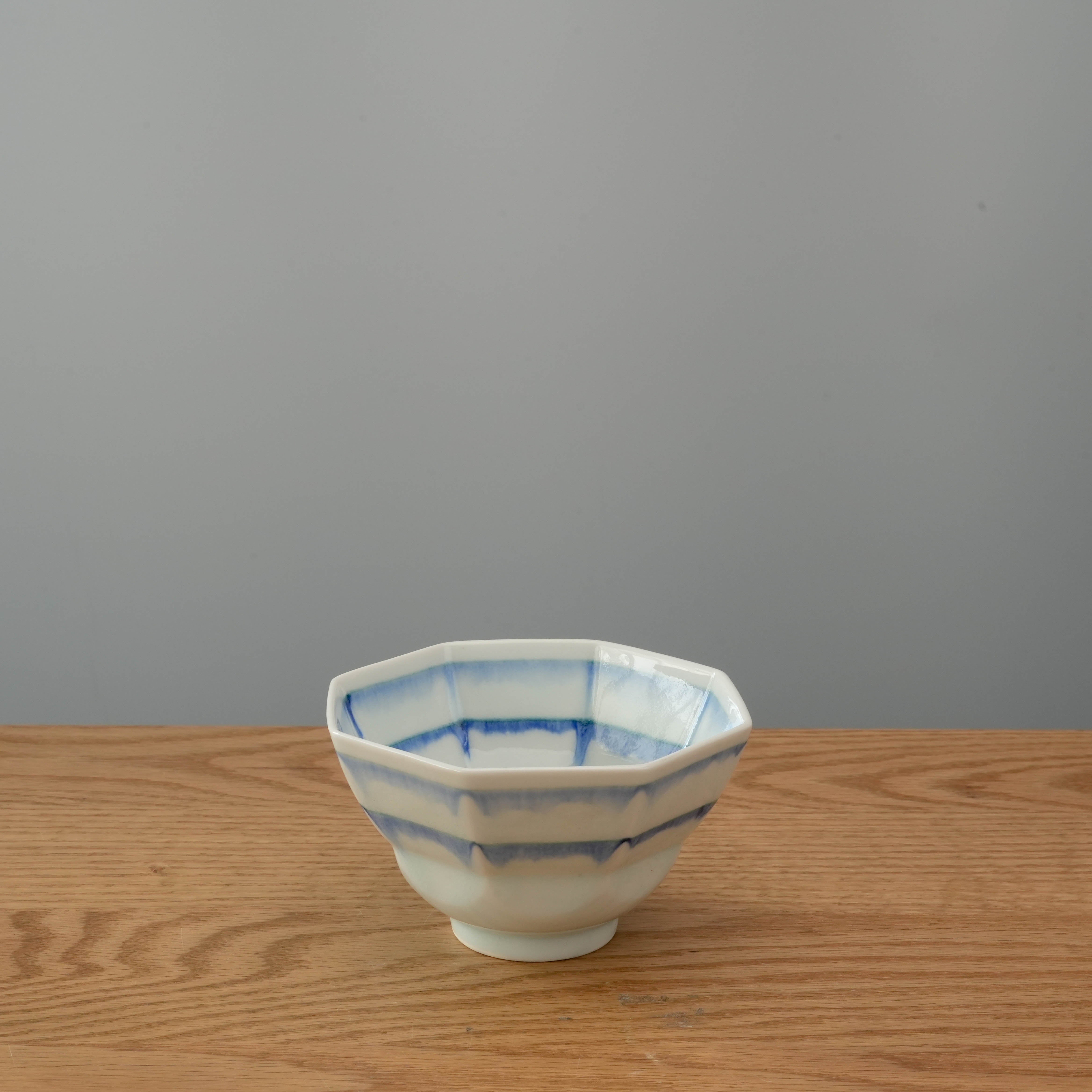 Mino Ware Indigo Glaze Octagonal Small Bowl with geometric shape and soft blue glaze, ideal for serving desserts or side dishes in Japanese style.