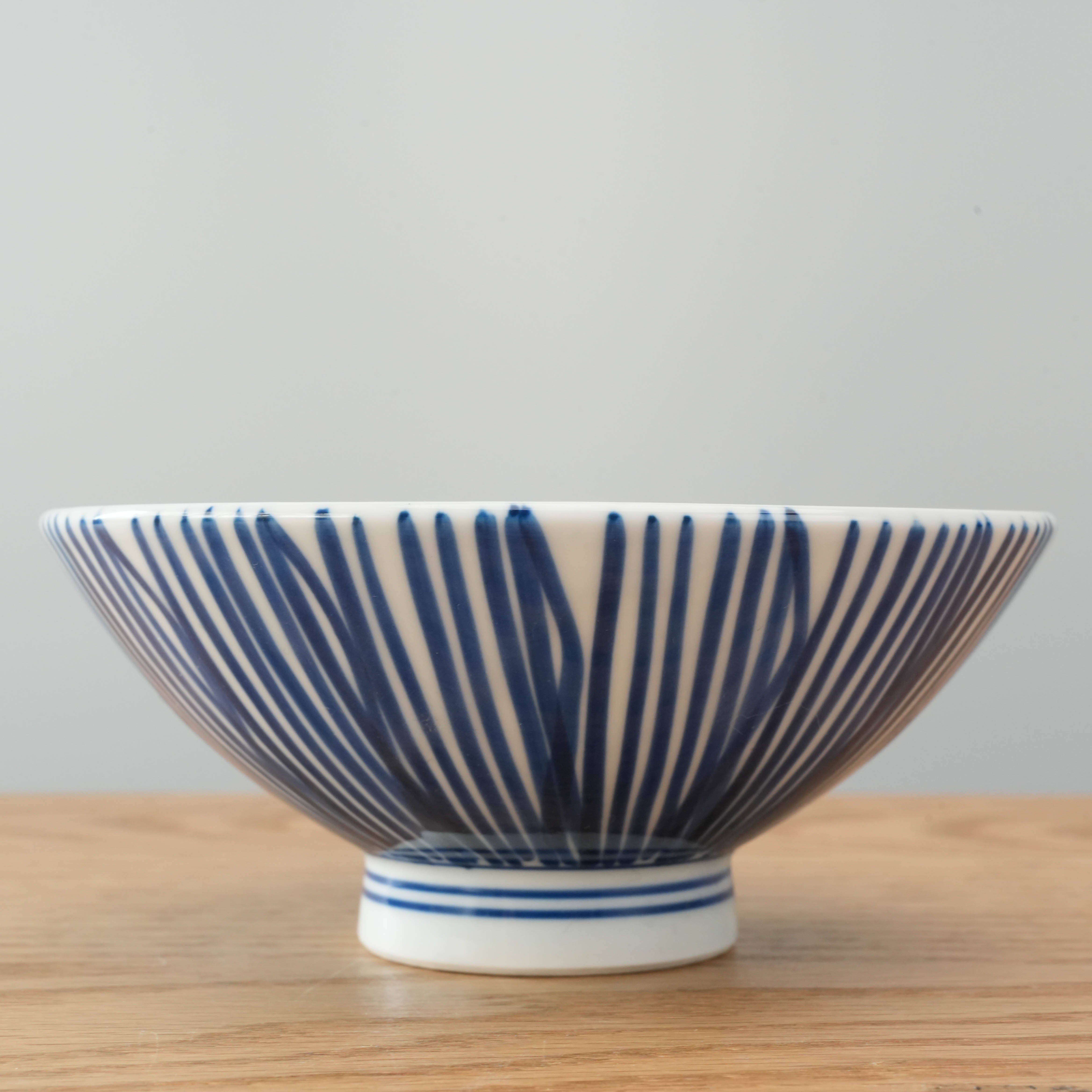 Close-up of Japanese Mino Ware Rice Bowl showcasing indigo thousand-line pattern, perfect for elegant tableware collections.