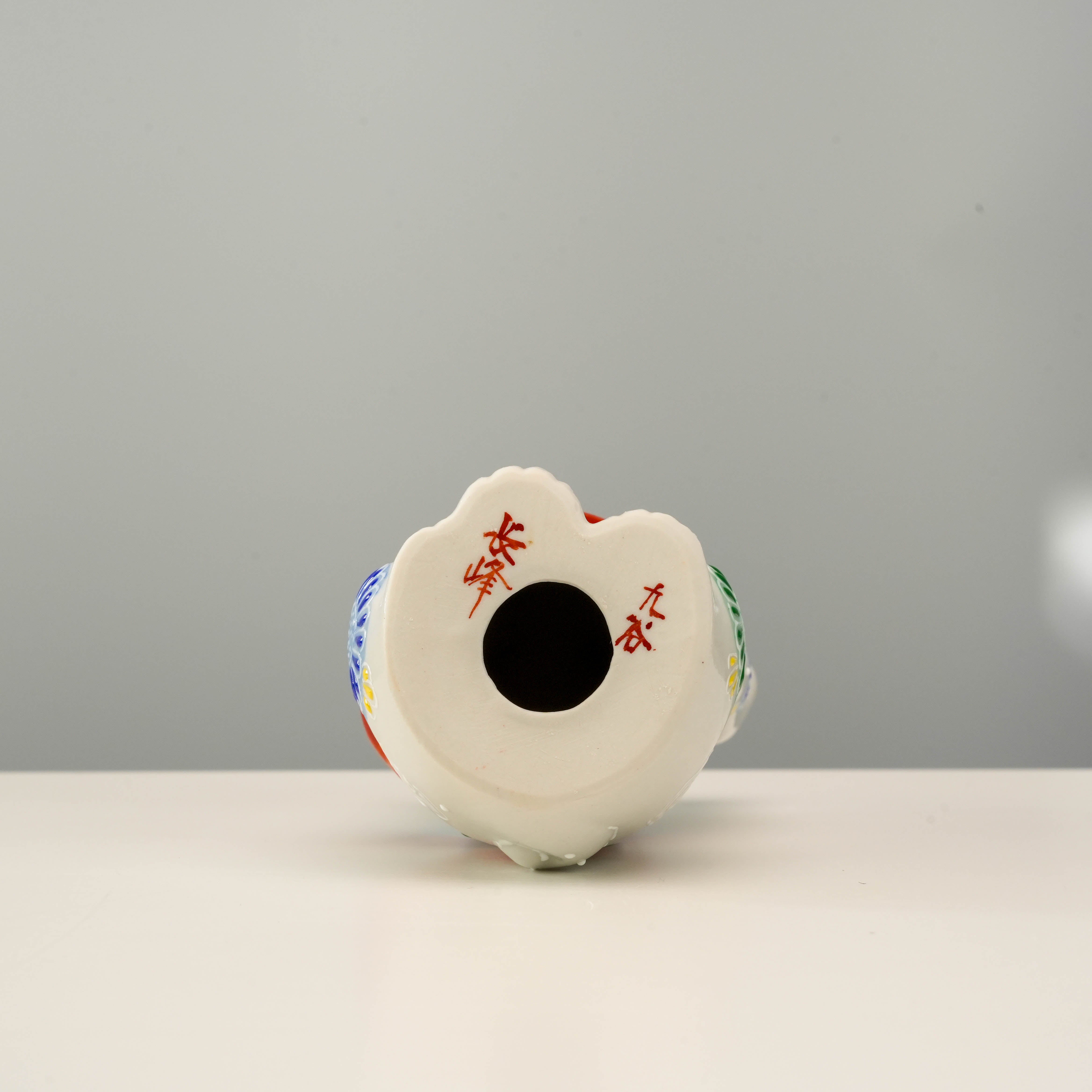 Bottom of Kutani Ware Cat Ornament - Lucky Cat with Japanese signature markings, showcasing authenticity and handcrafted quality.