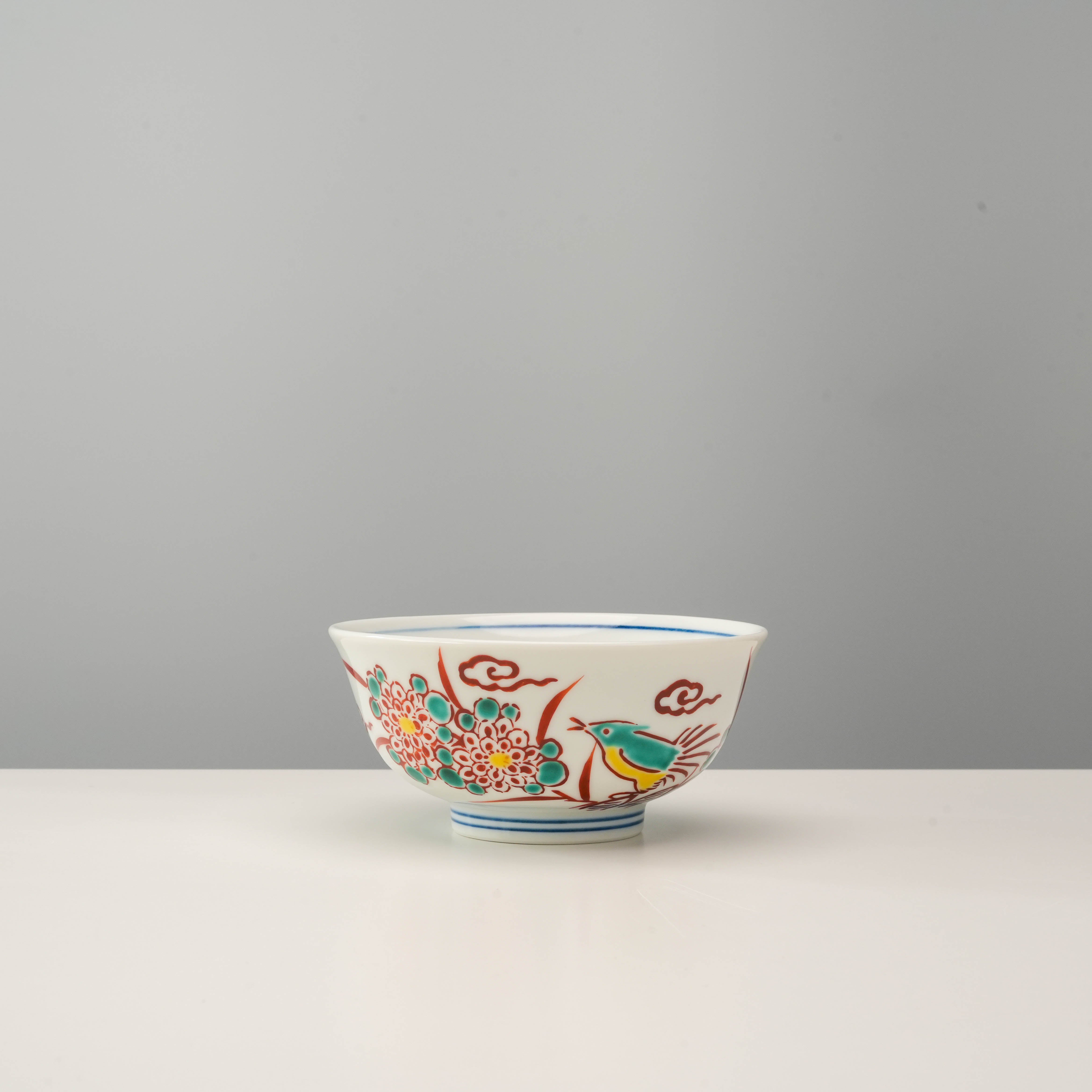 Traditional Kutani Ware Rice Bowl featuring red bird and chrysanthemum motifs, perfect for kitchen or dining décor.