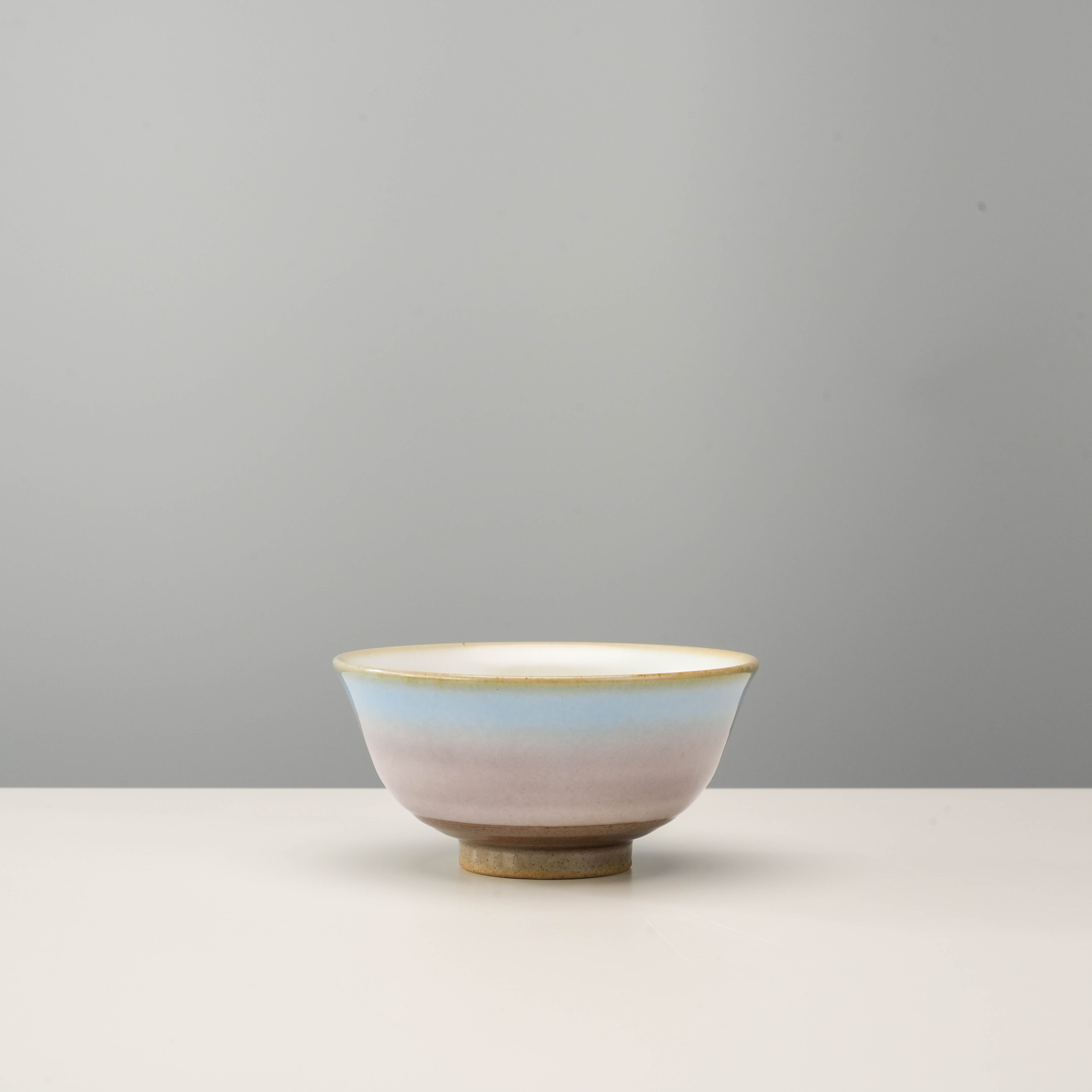 Single Kutani Ware Rice Bowl with Yusai Glaze in soft pink and blue hues, perfect for elegant table settings or unique dinnerware gifts.