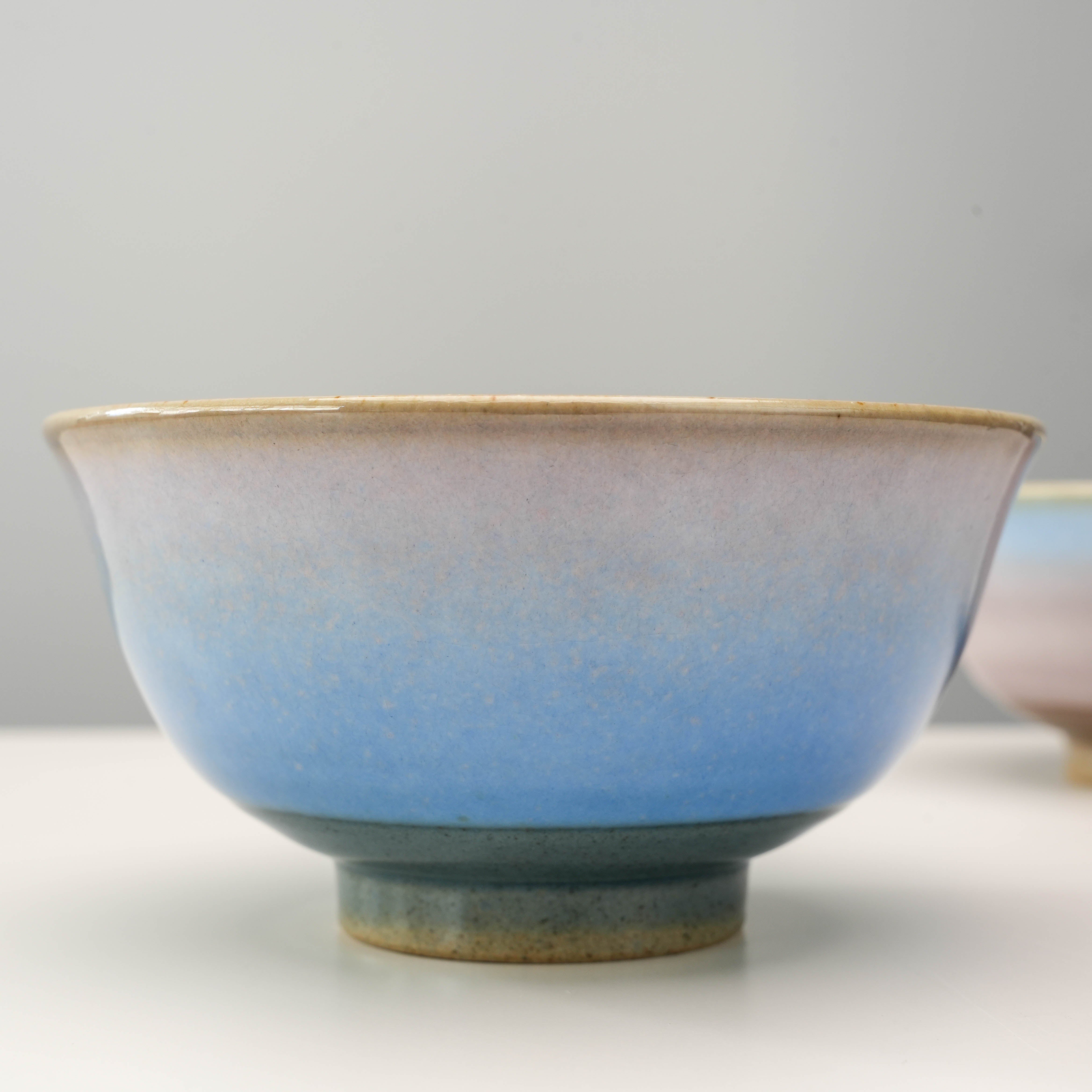 Close-up of blue Kutani Ware Rice Bowl with Yusai Glaze, highlighting the detailed hand-applied gradient and artisanal texture.