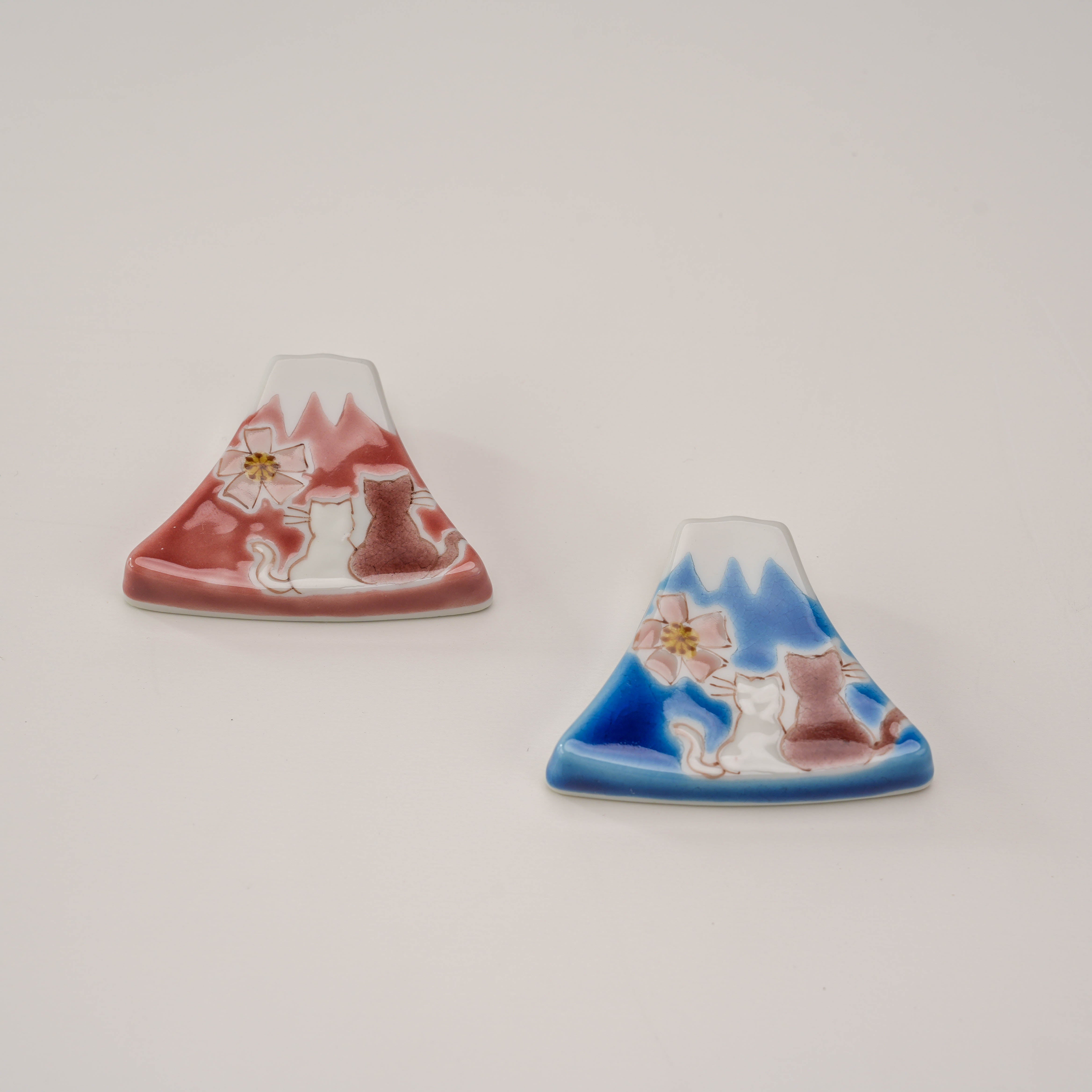 Kutani Ware Chopstick Rests - Fuji & Cats set featuring hand-painted red and blue Mt. Fuji designs with two cats and cherry blossoms.