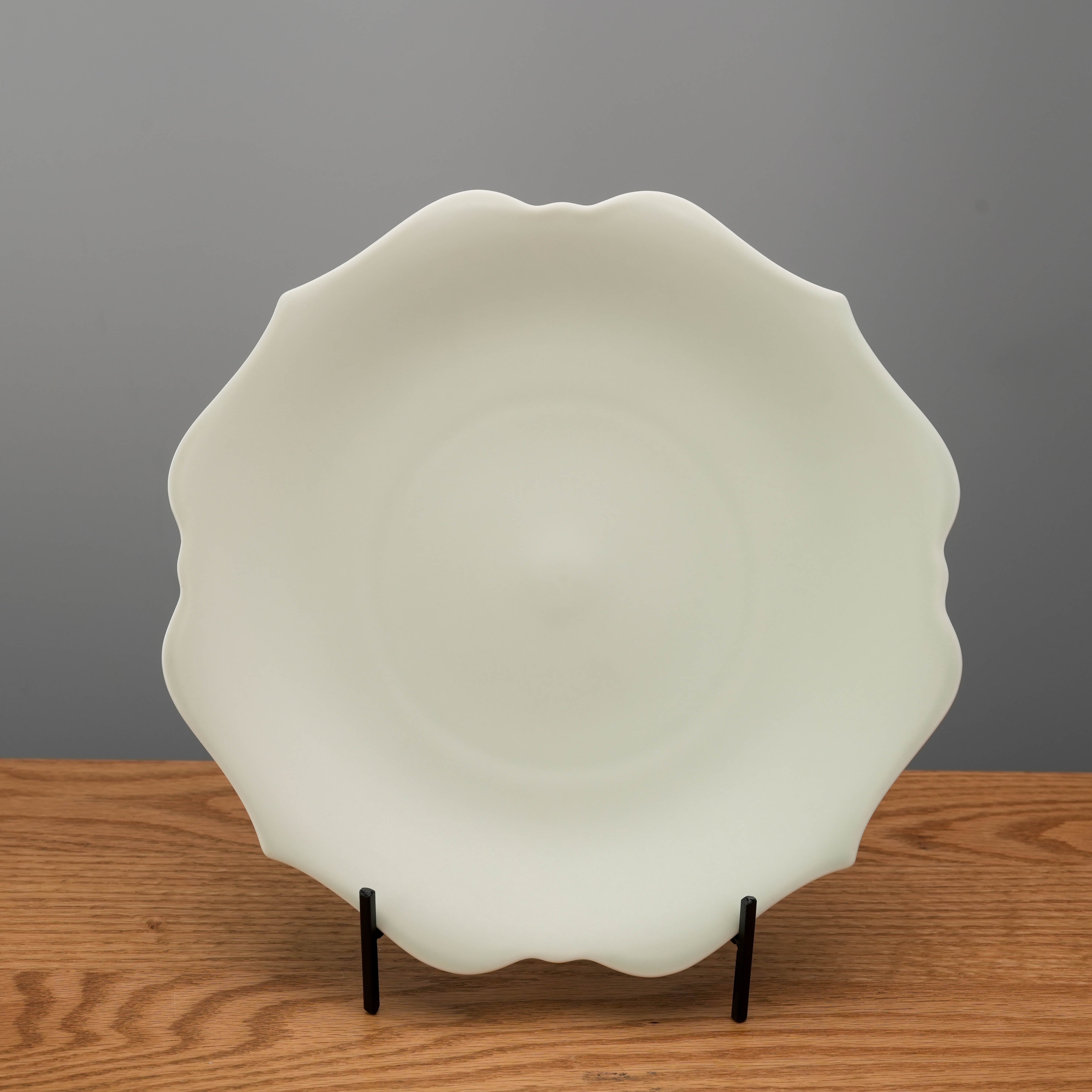 Mino Ware Meimei Plate - Light Cyan with flower scalloped edge on display stand, ideal for elegant dining settings.